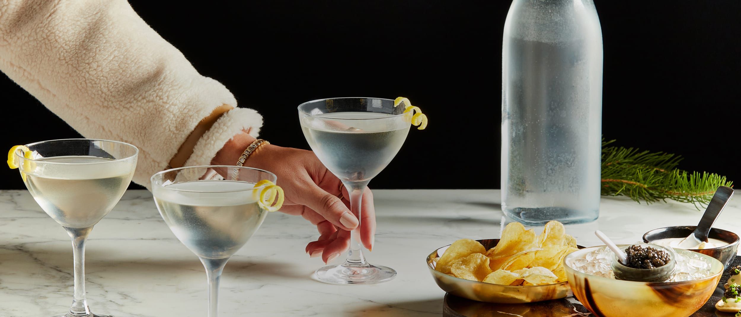 Chilled martinis with a twist, with salty, savory snacks.