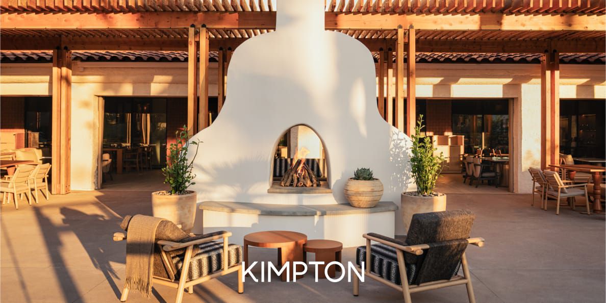 Kimpton Miralina Resort & Villas outdoor lounge with fire pit, modern seating, and warm evening ambiance