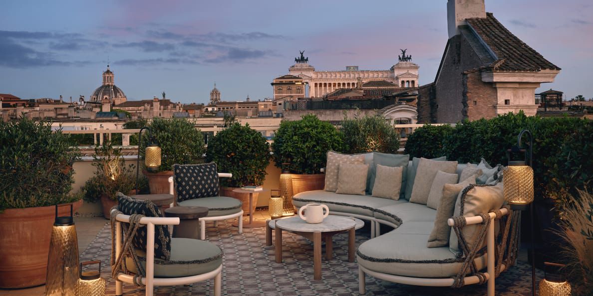 Six Senses Rome luxury hotel rooftop terrace with city skyline views in Rome, Italy