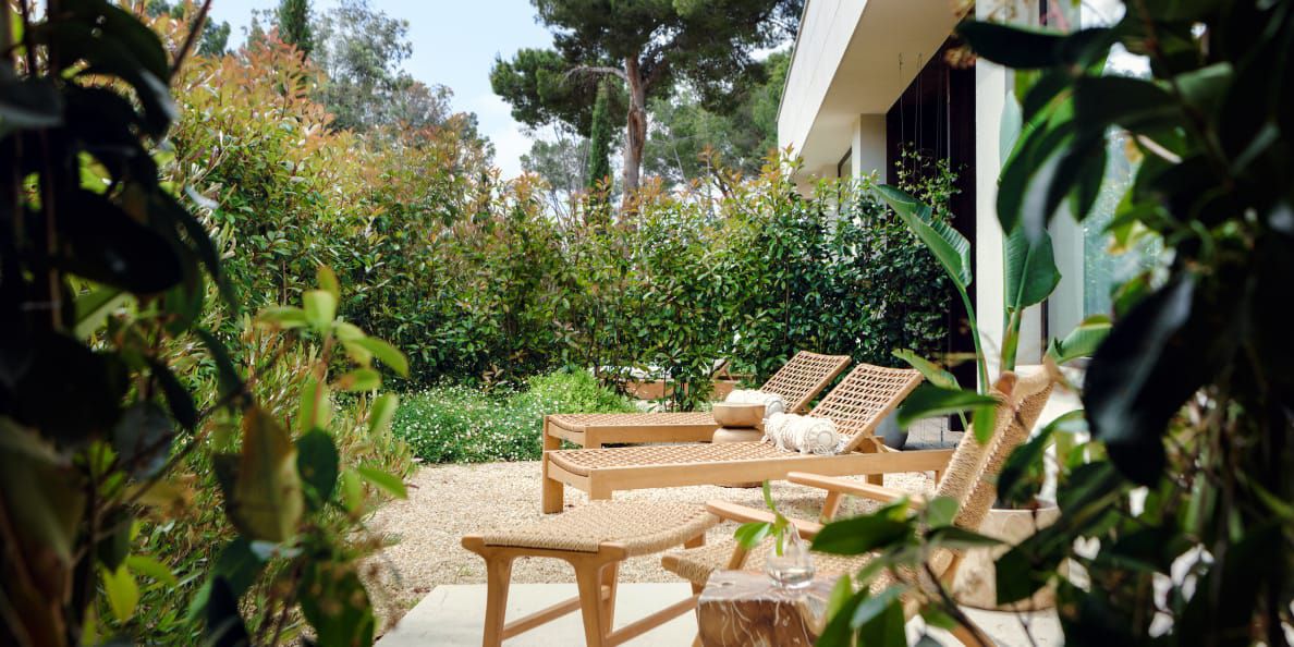 Kimpton Mallorca boutique hotel garden terrace with outdoor seating in Spain