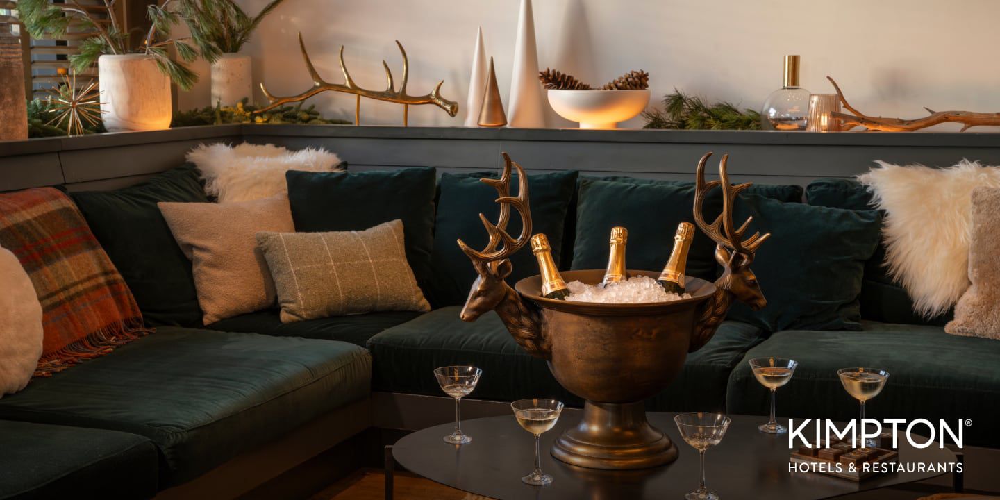 Kimpton Hotels & Restaurants luxurious lobby seating area decorated for winter