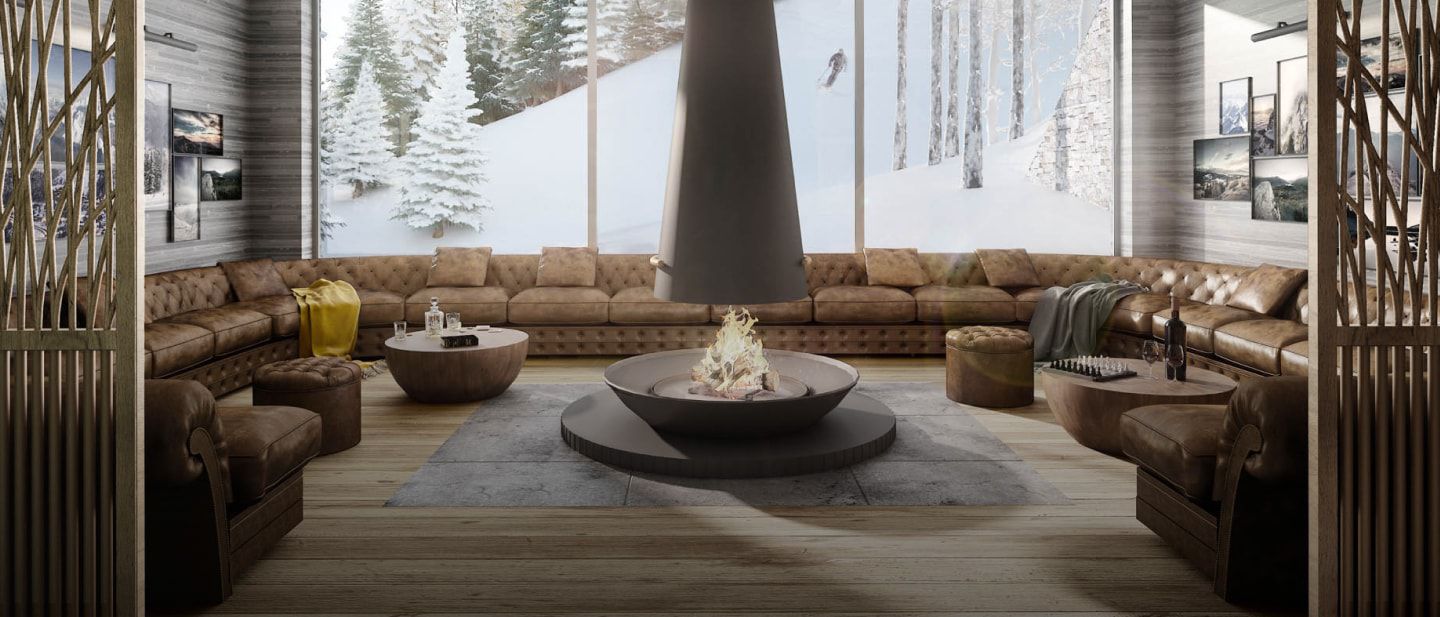 luxurious lobby living room with leather seating around a fireplace and a view of the snow