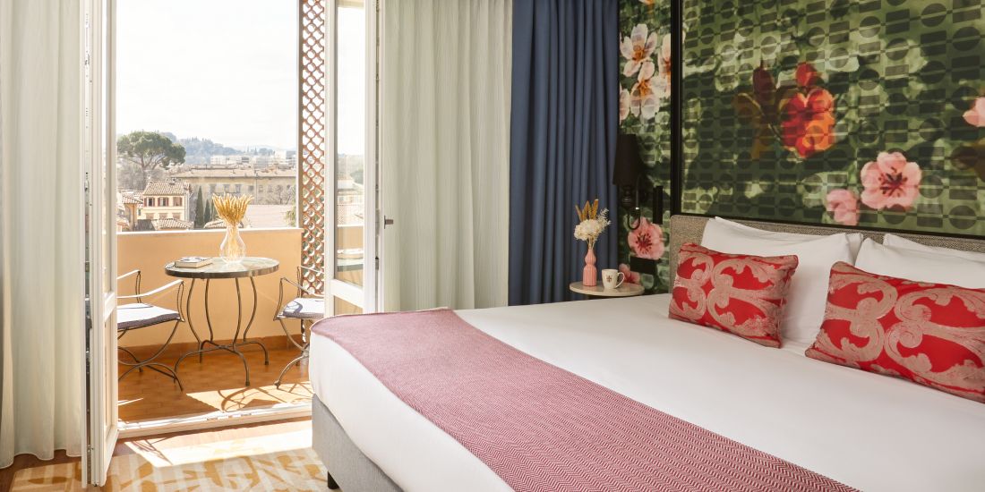 Guest room with a balcony at Hotel Indigo Florence
