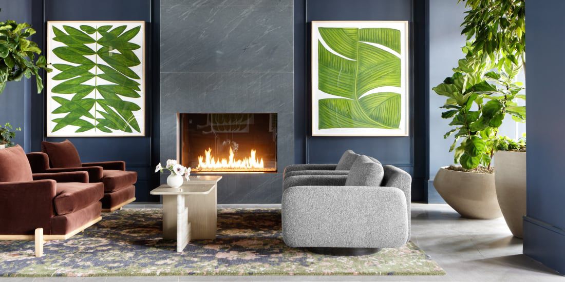 Kimpton Charlottesville lobby with fireplace and greenery