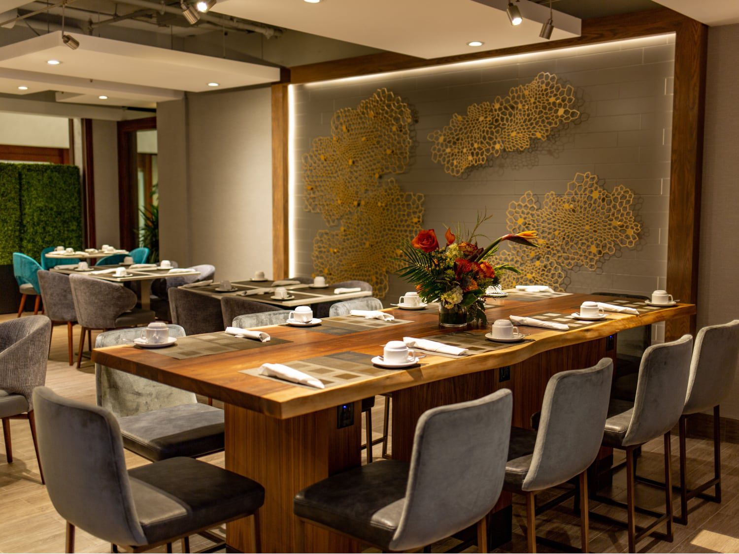 Dining table with floral centerpiece at Holiday Inn Toronto Downtown Centre