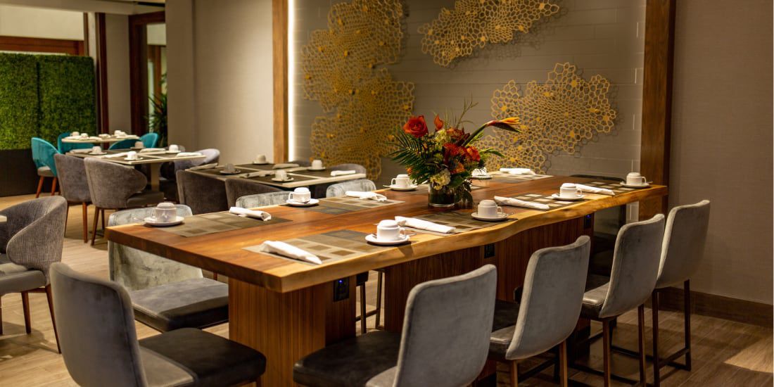 Dining table with floral centerpiece at Holiday Inn Toronto Downtown Centre