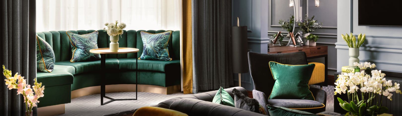 Plush hotel seating area in rich jewel tones