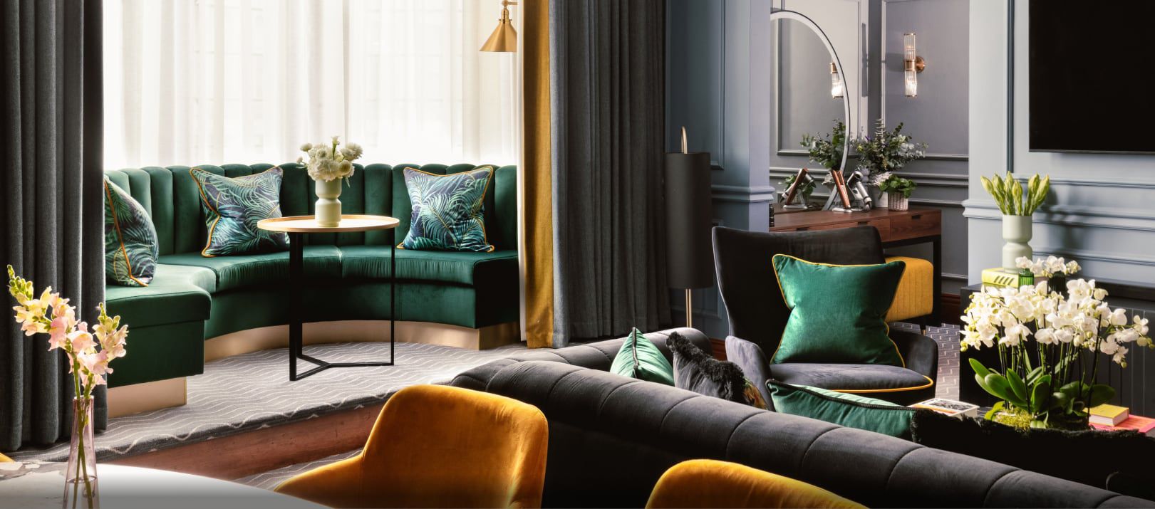 Plush hotel seating area in rich jewel tones