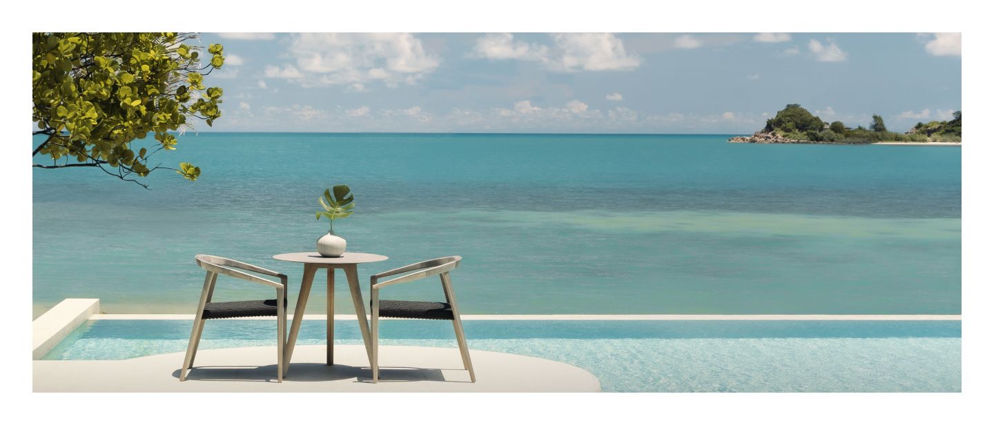  Dining table suspended over oceanside infinity pool