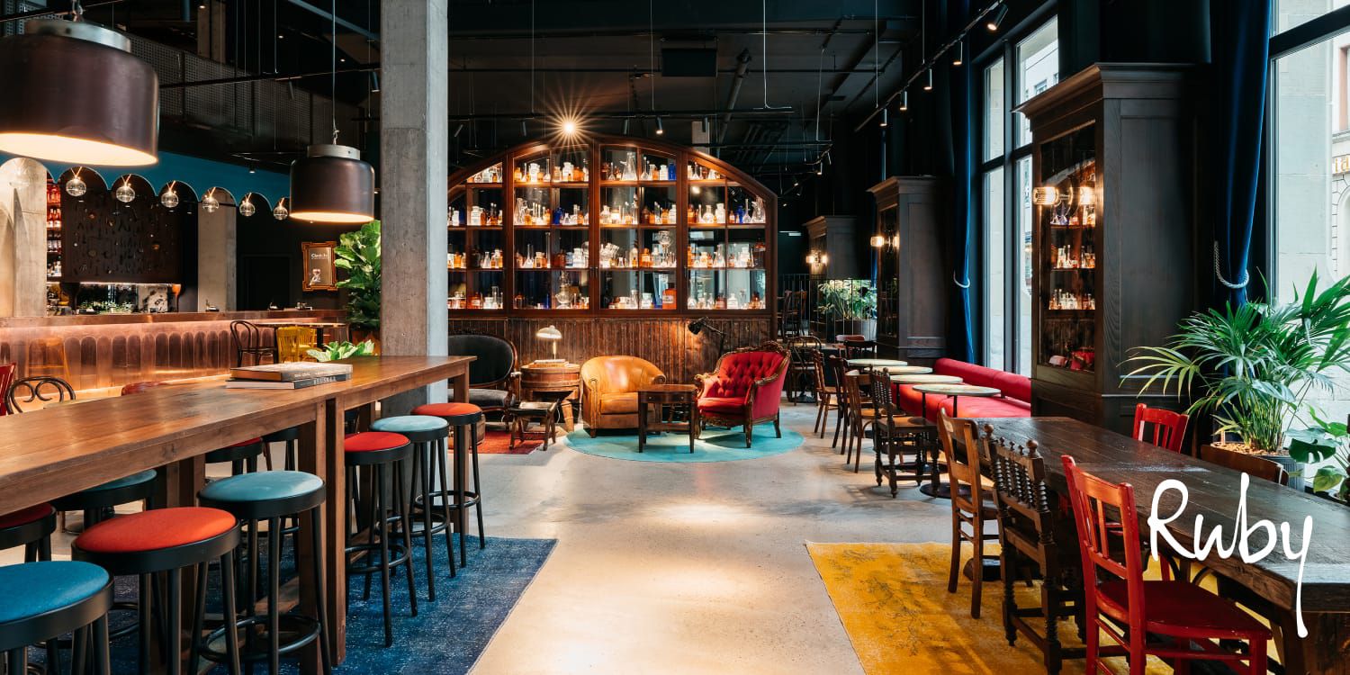 Modern hotel bar with ample colorful seating