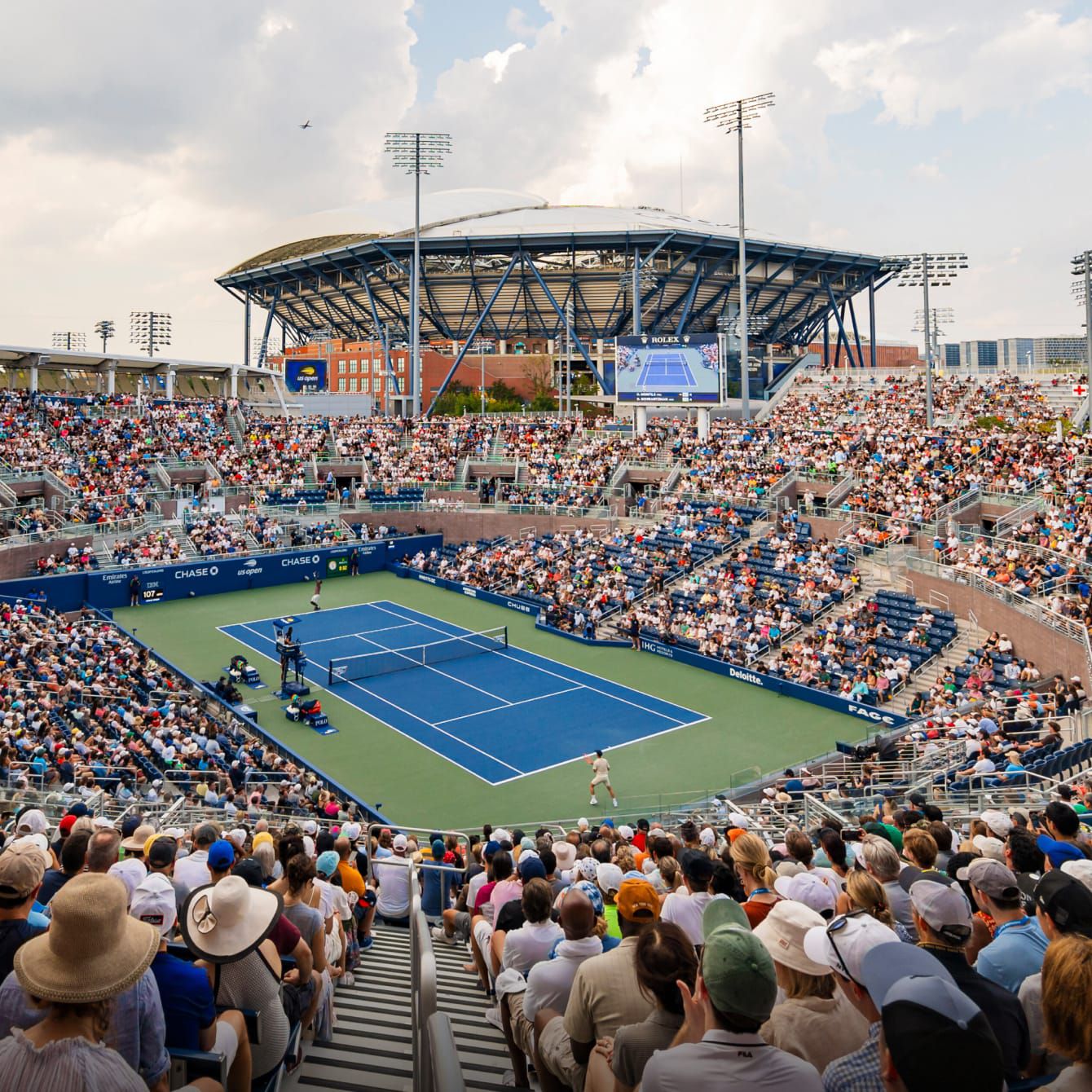 Outdoor US Open tennis court view from crowd