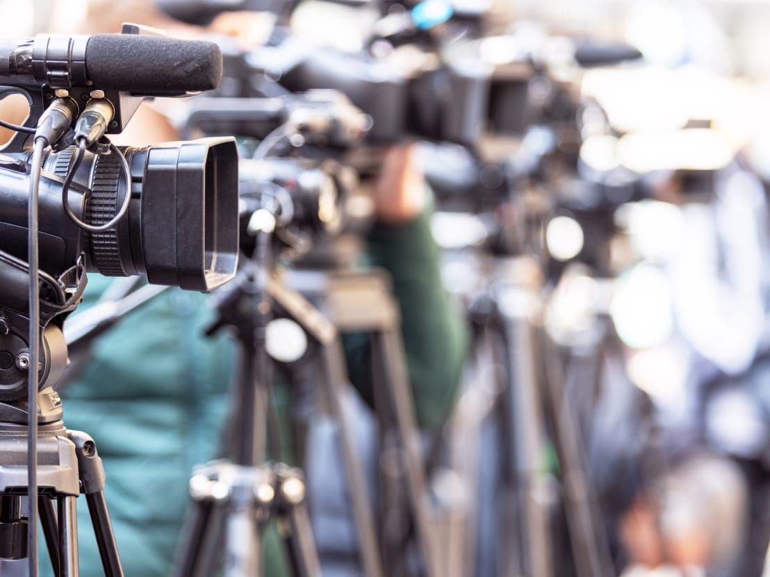 Close up shot of a line of cameras ready for the match.