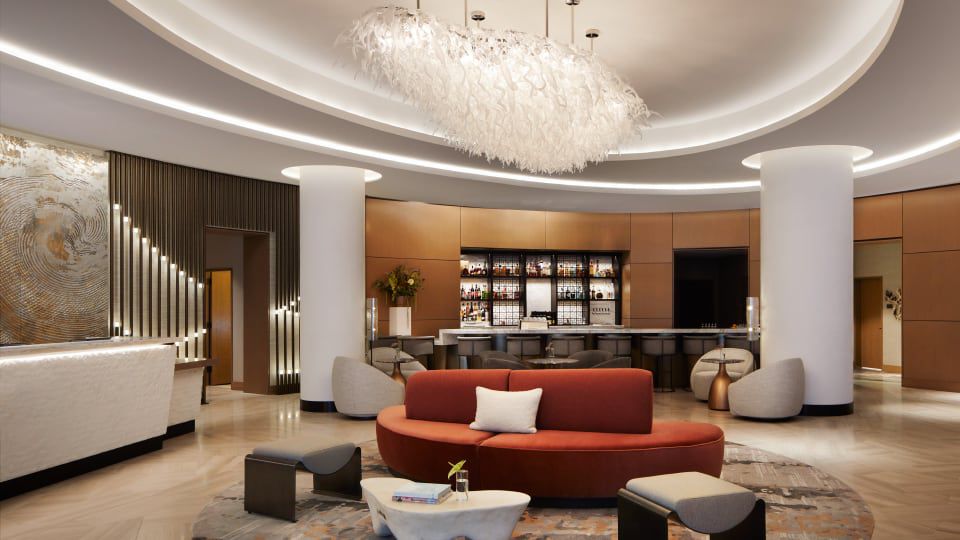 Lobby of the Intercontinental Seattle Bellevue with couches, chairs and large beautiful columns