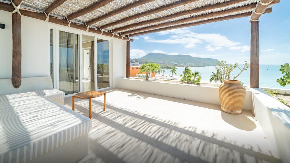 Refreshing open air patio overlooking a gorgeous ocean vista at a Hotel Indigo