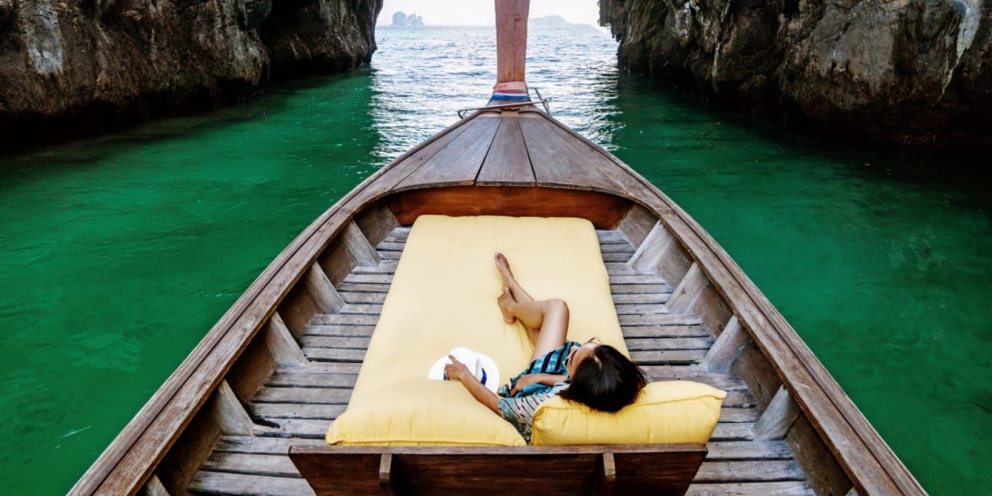 Woman relaxing on boat 