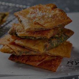 Background image of a pastry from the hotel restaurant.