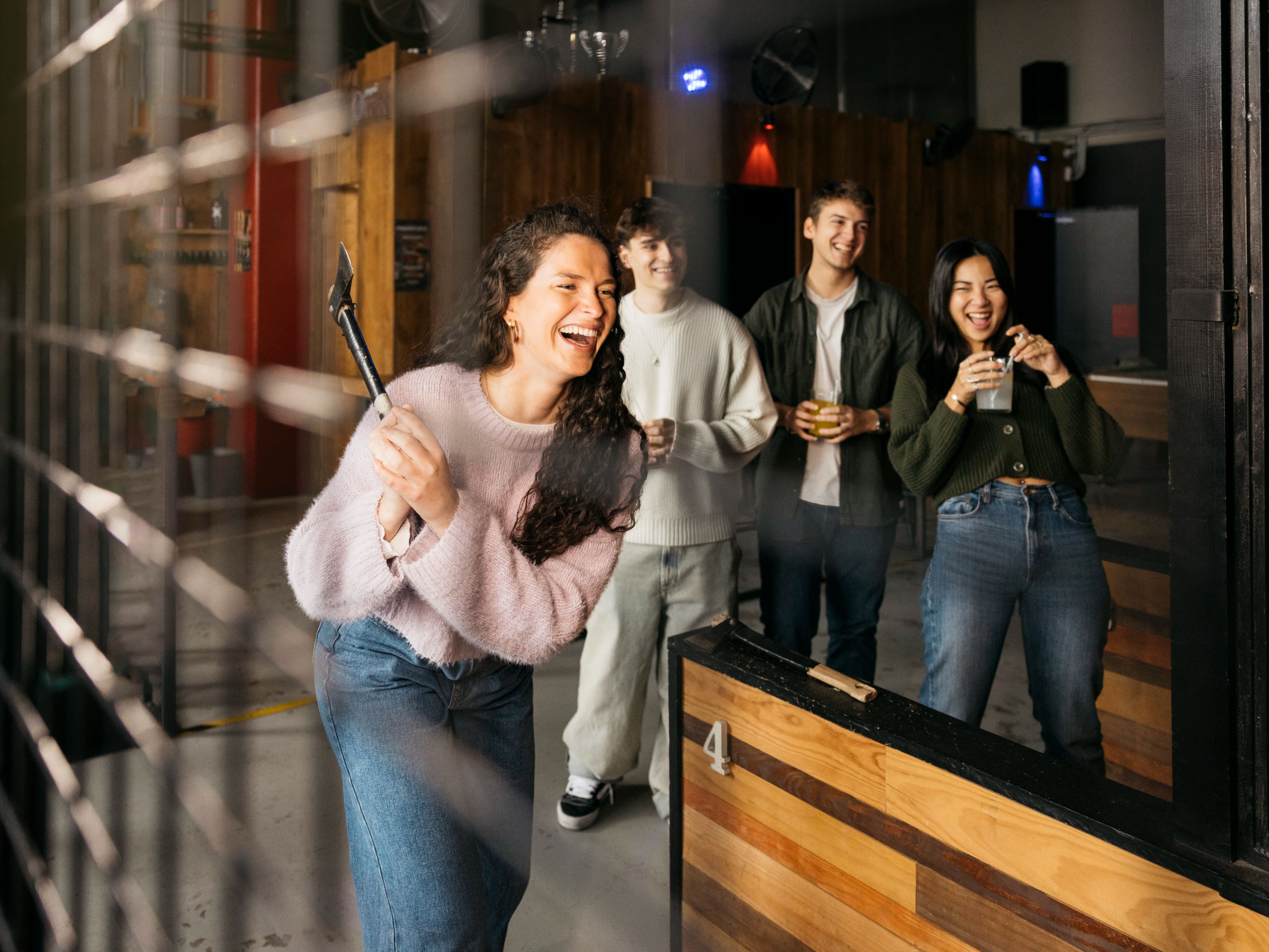Group of friends at an axe throwing place