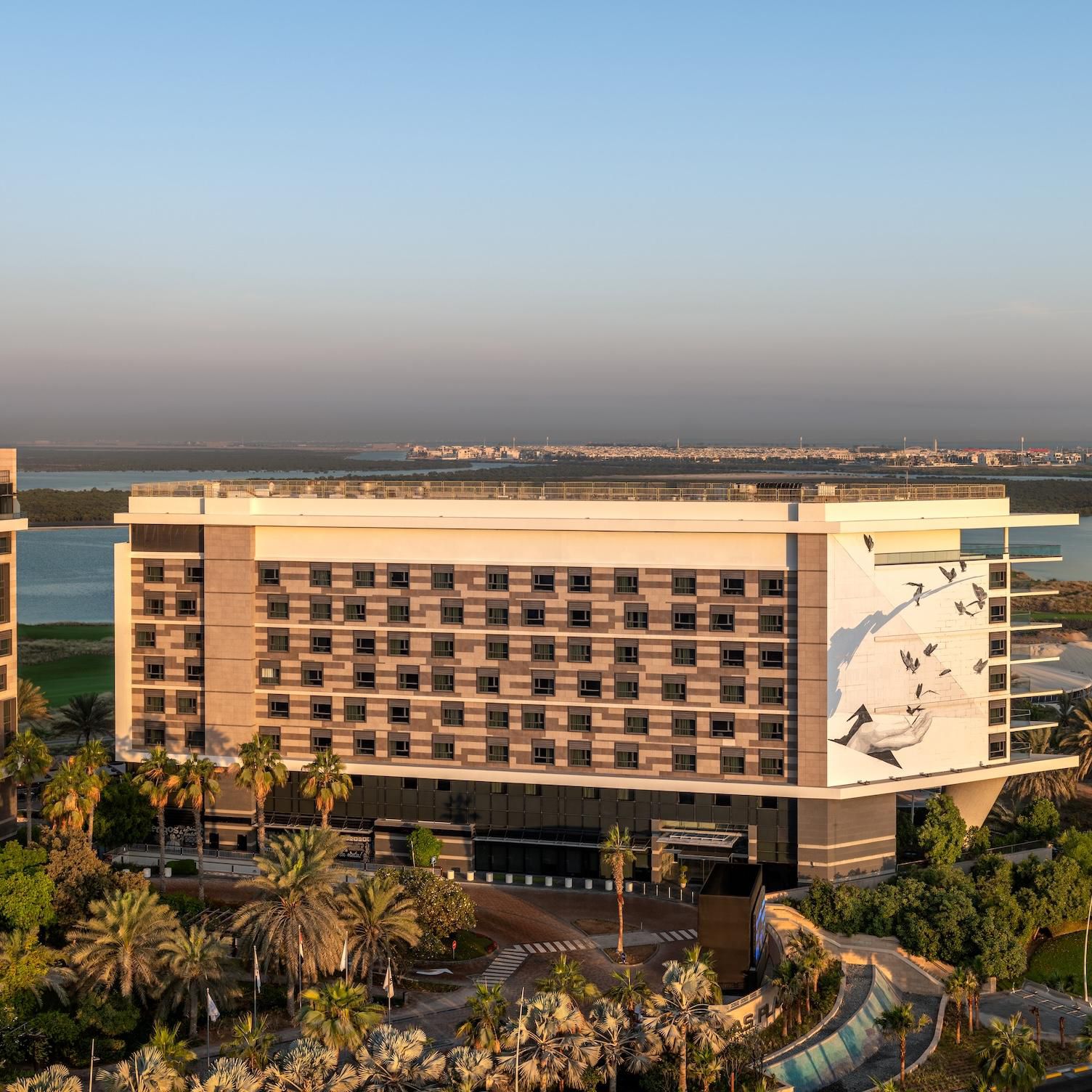 Yas Plaza Bay surrounded by greenery with sea views