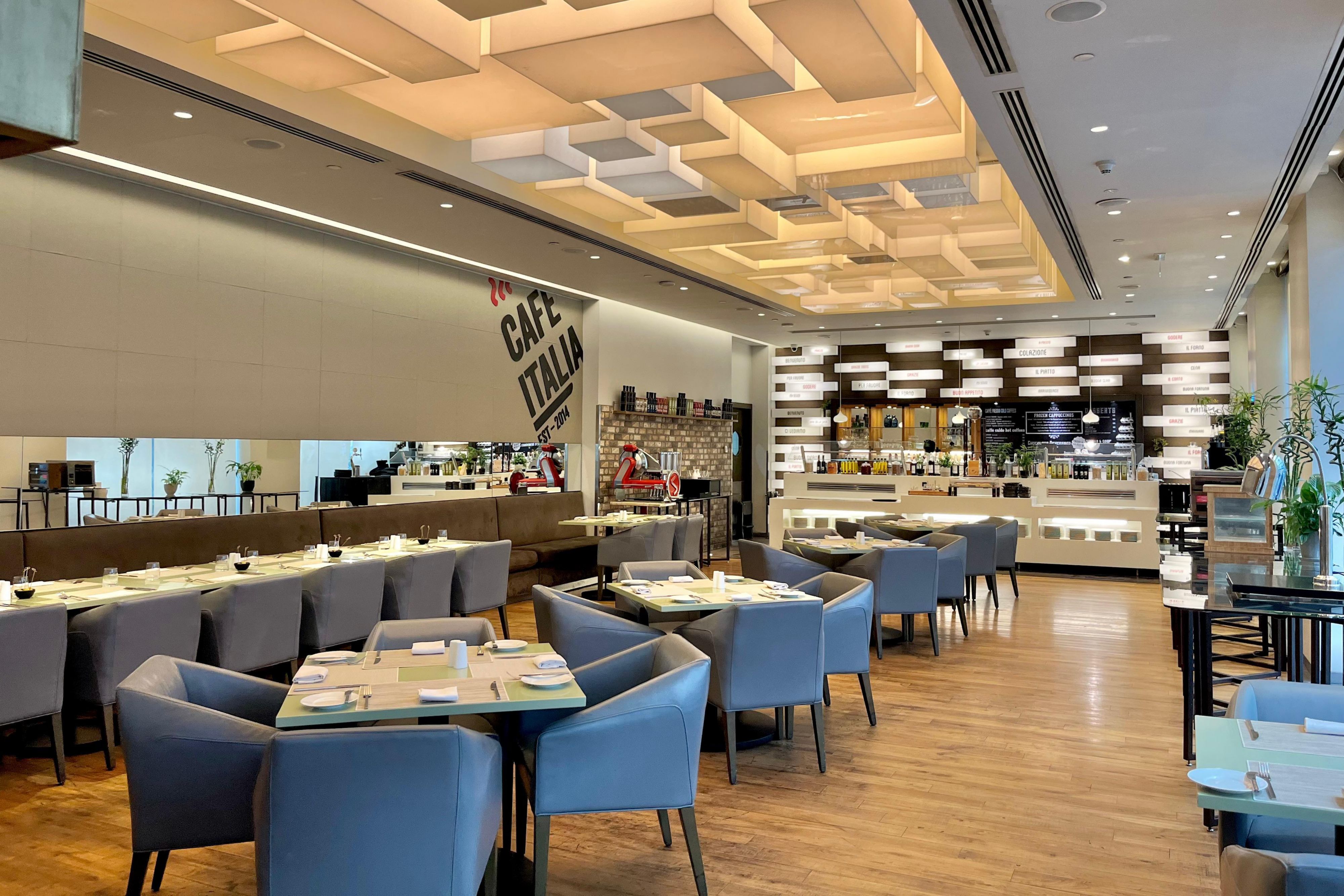 Café Italia offers authentic Italian cuisine in a warm, contemporary setting with a seasonal outdoor terrace. Enjoy signature appetizers, salads, and dishes, along with delightful desserts. The Terrace is perfect for evening coffee, serving Italian selections and frozen cappuccinos.
