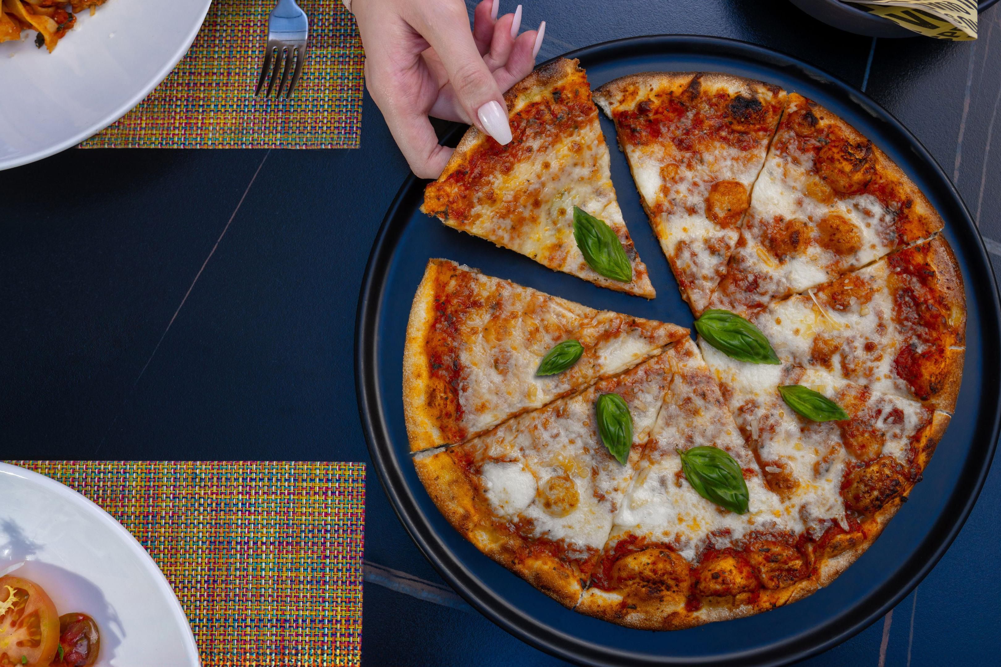 Café Italia offers authentic Italian cuisine in a warm, contemporary setting with a seasonal outdoor terrace. Enjoy signature appetizers, salads, and dishes, along with delightful desserts. The Terrace is perfect for evening coffee, serving Italian selections and frozen cappuccinos.