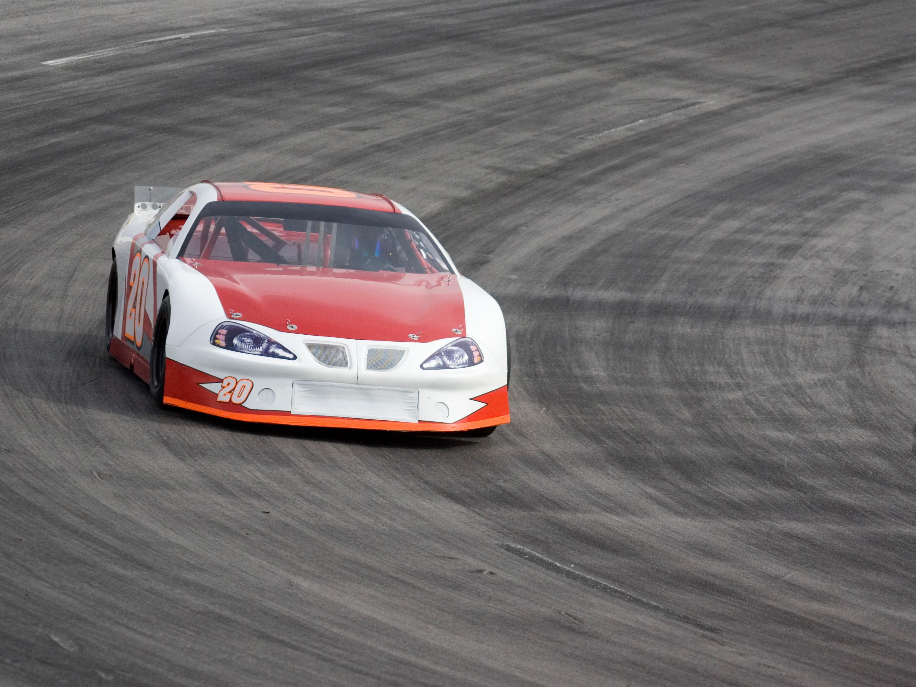 A racecar driving down the track in Charlotte, North Carolina.
