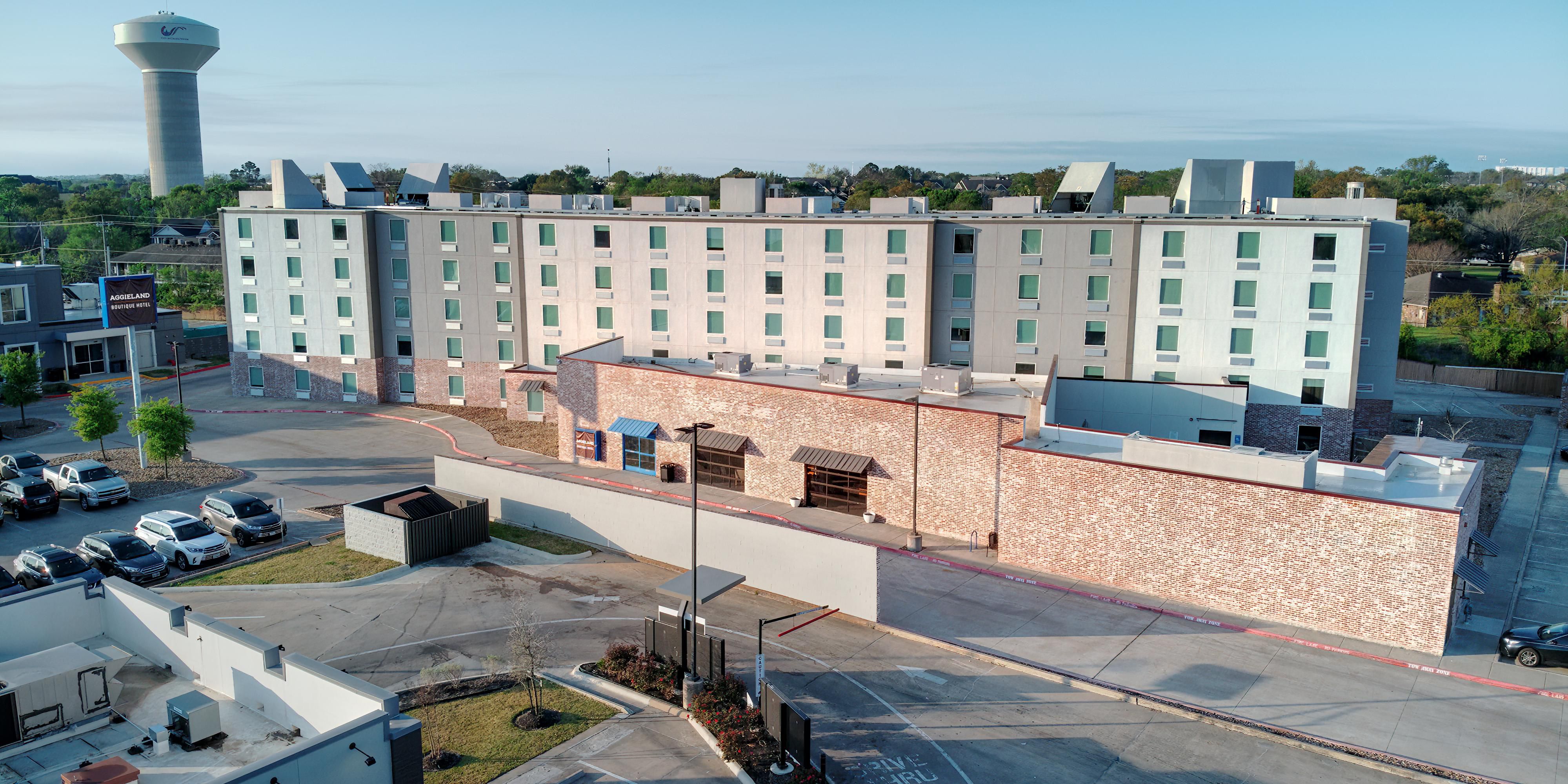 Enjoy rooms facing Kyle Field at Aggieland Boutique Hotel - College Station, just 2.7 miles from the stadium. Perfect for Aggie fans, relax in spacious rooms, unwind by the pool, and soak up the game day spirit with unbeatable views and comfort.