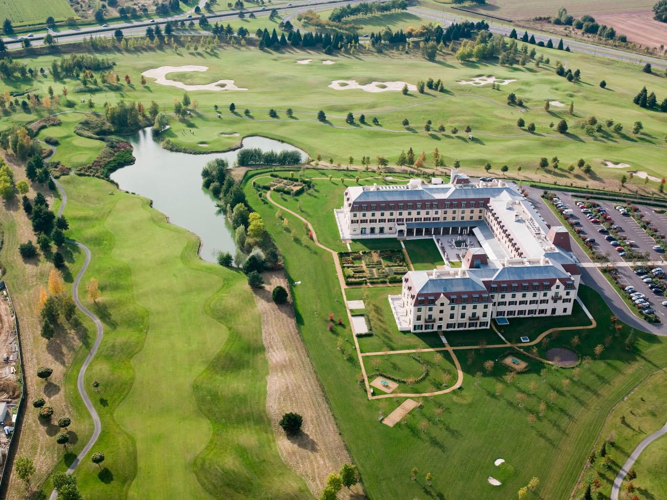 Hotel Paris, Marne-la-Vallée offers complimentary shuttle service to Disneyland Paris, easy access to central Paris and La Vallée Village, on-site parking with electric charging stations, and convenient connections to major airports and train stations of "Marne-la-Vallée - Chessy" for seamless travel.