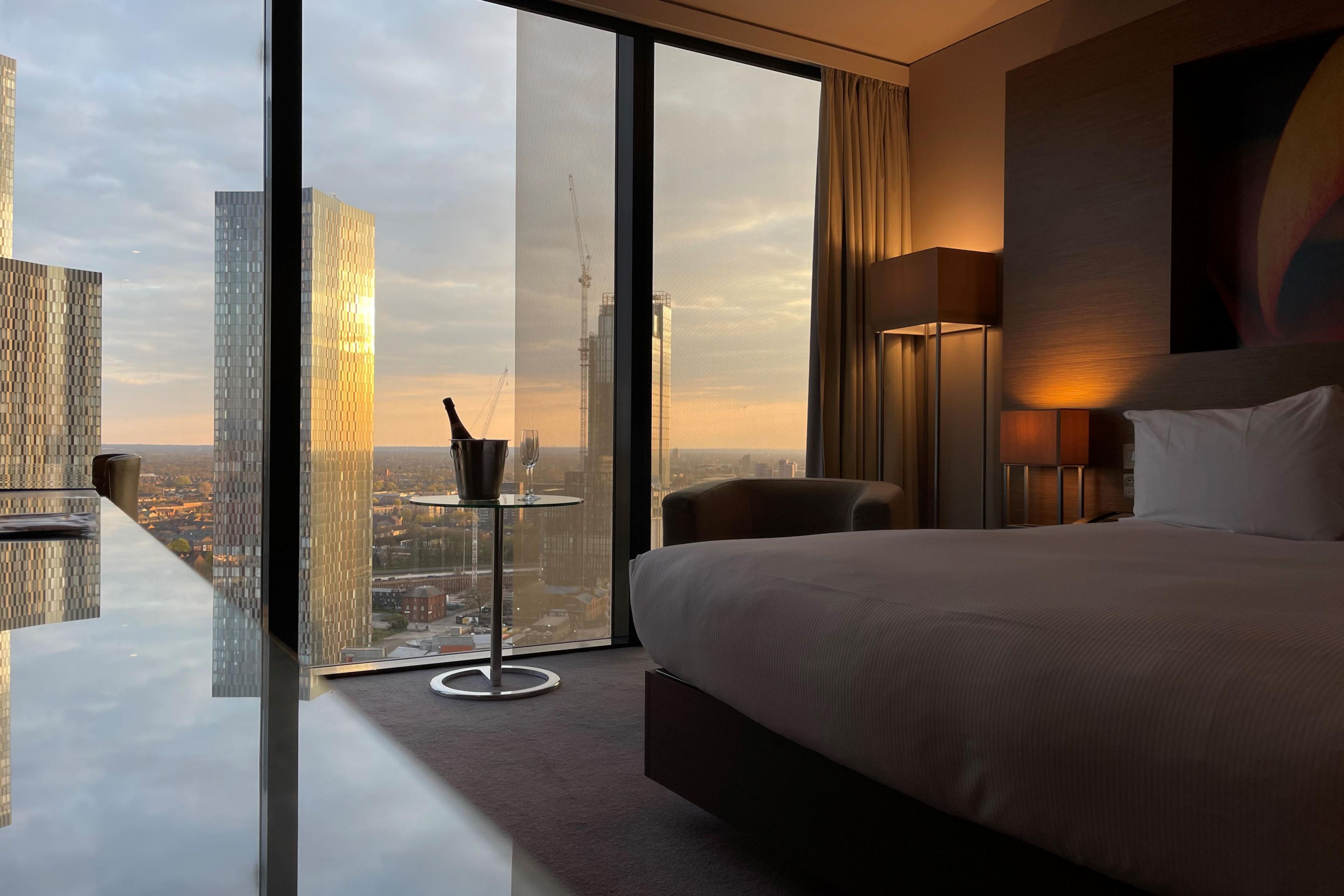 At The Deansgate Hotel Manchester, our rooms and suites are your personal sanctuary in the city. Each room features floor-to-ceiling windows showcasing stunning views of Manchester’s skyline. With modern décor, plush bedding, and thoughtful amenities, you’ll enjoy the perfect blend of style and relaxation.