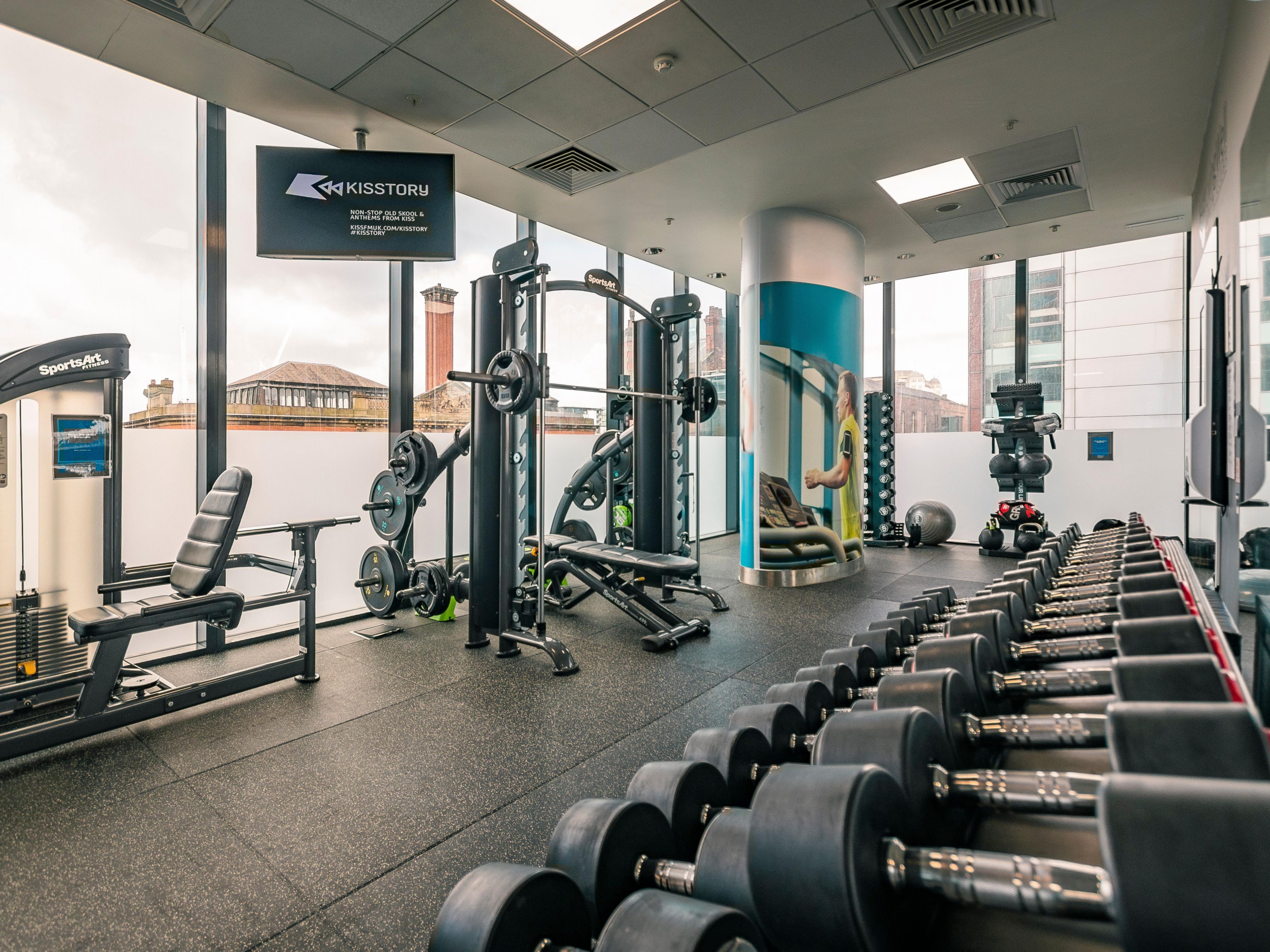 Fully equipped fitness centre with Manchester views