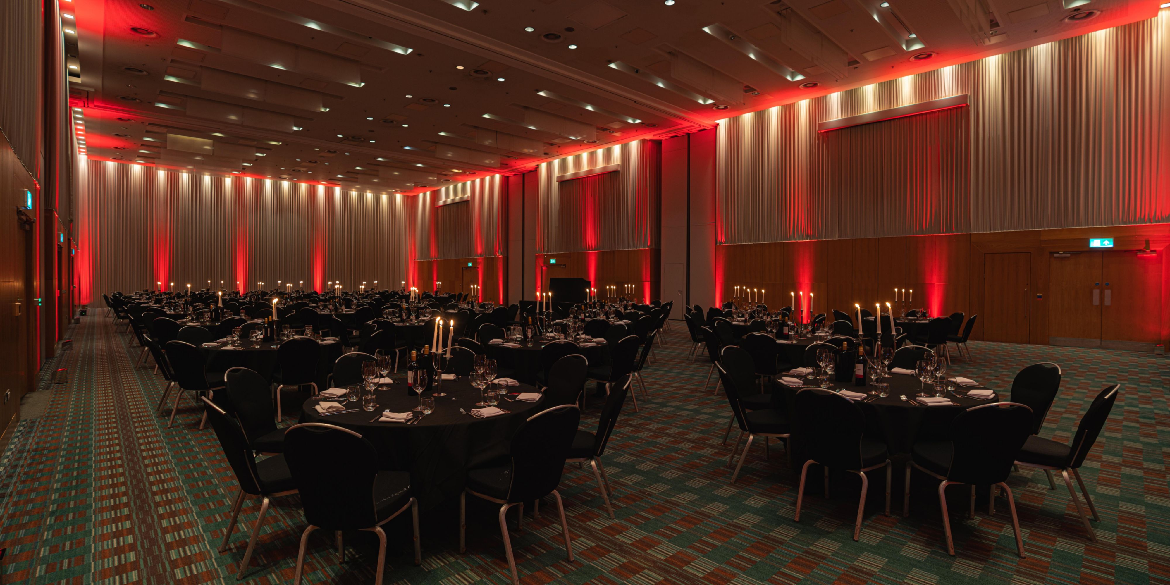 Large event venue for hire in Manchester Deansgate with red low lighting