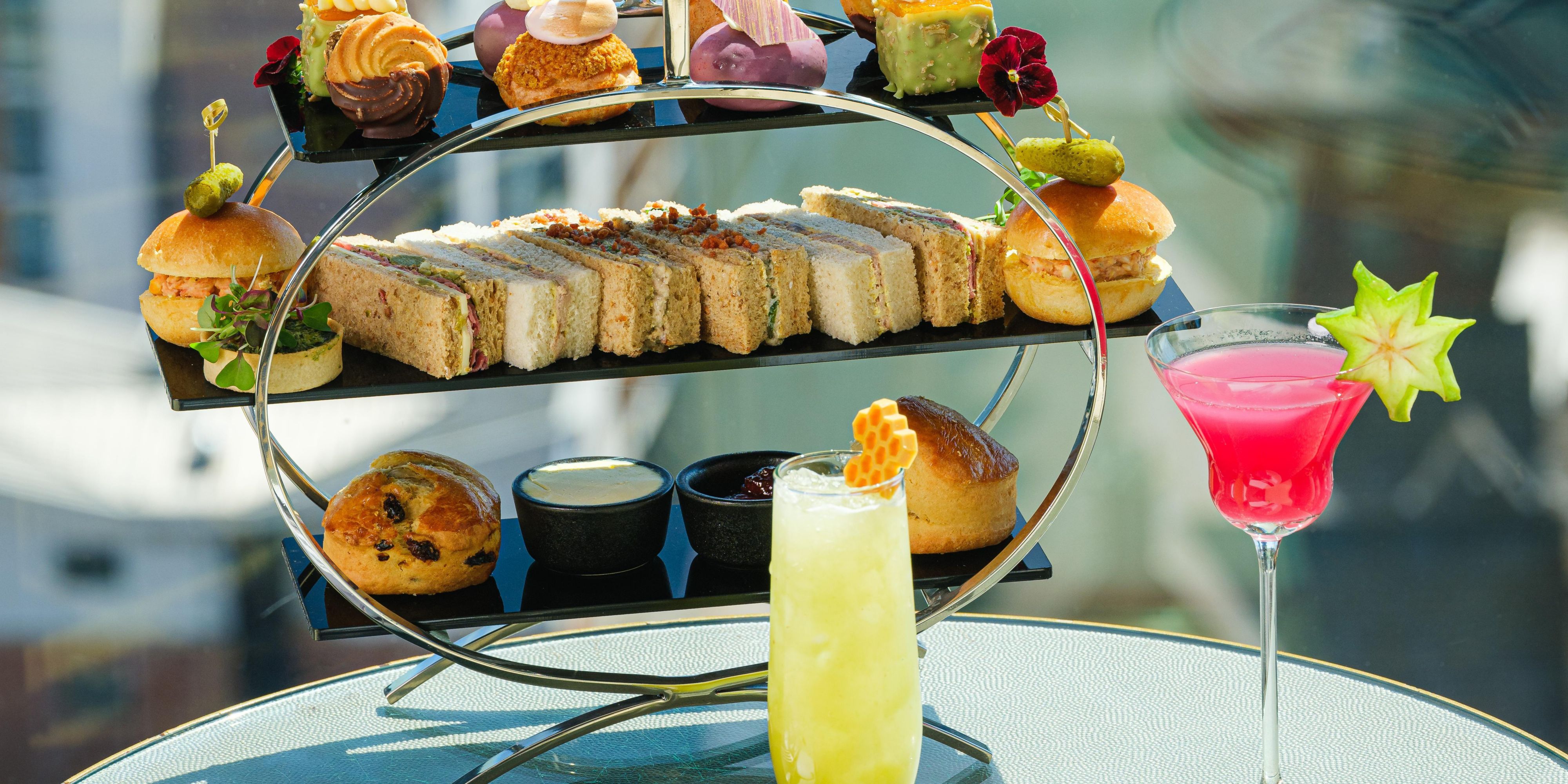 afternoon tea with colourful cocktails