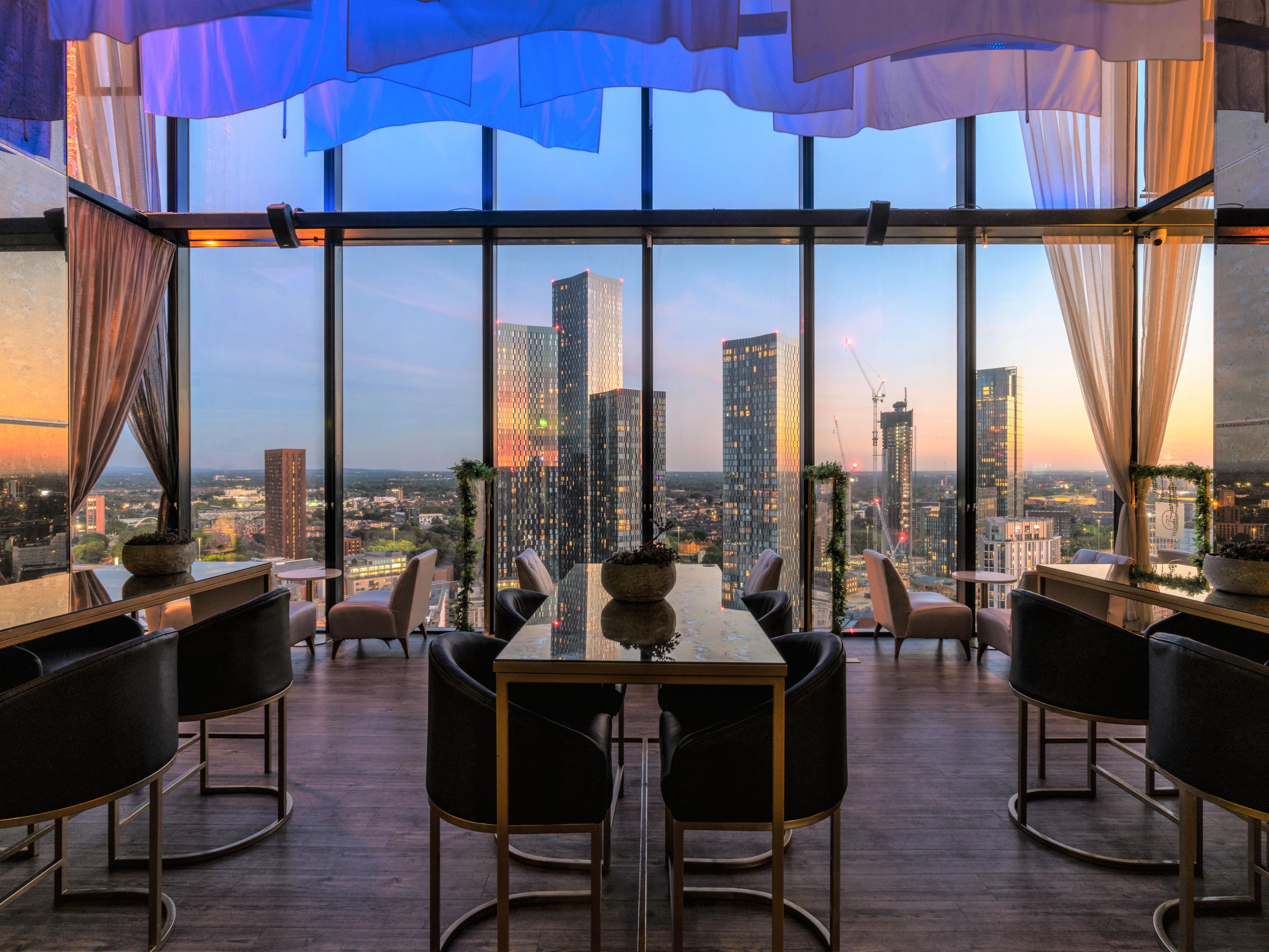 Restaurant and bar with sky view at sunset