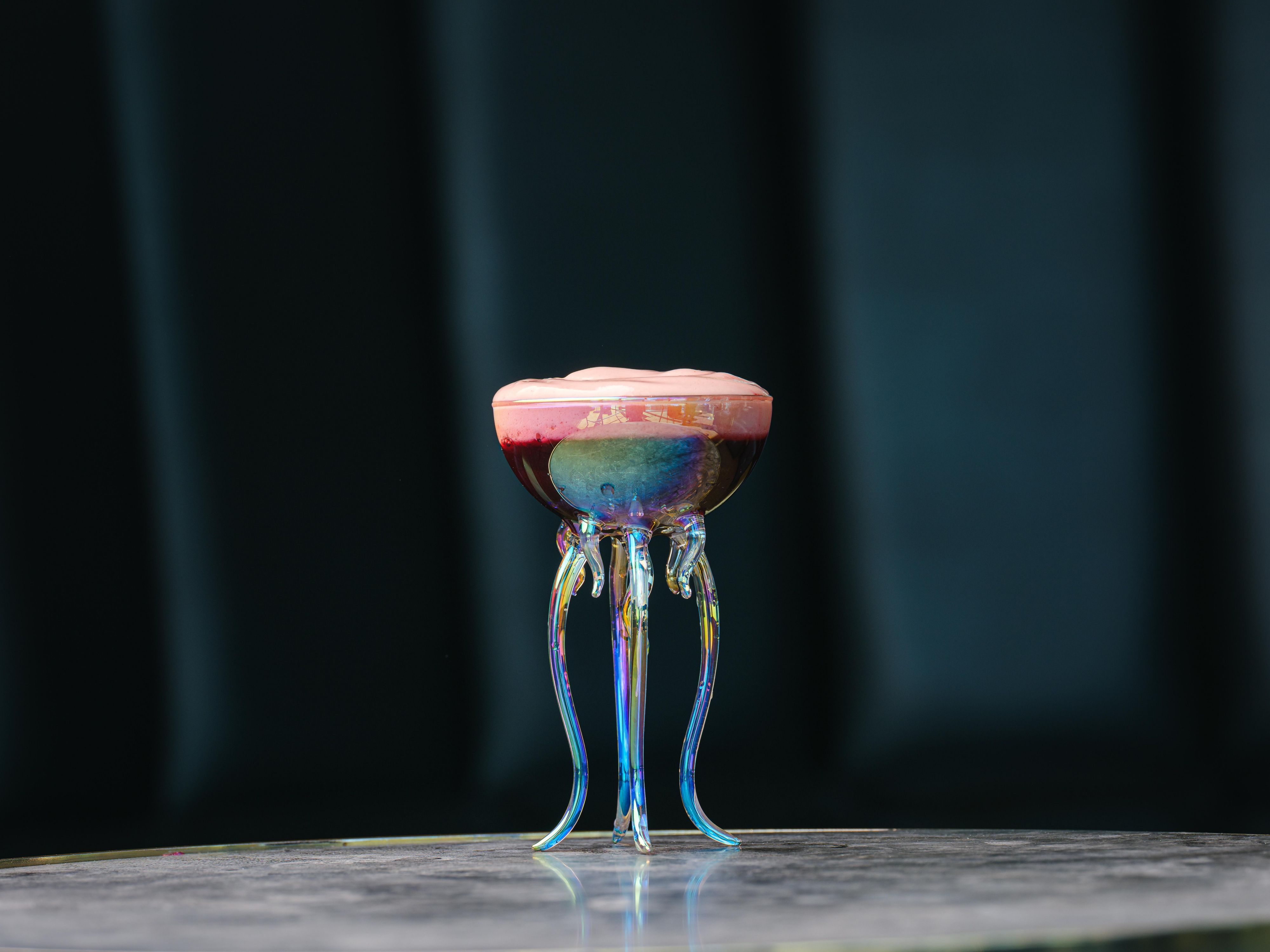 Cocktail in a jelly-fish inspired glass