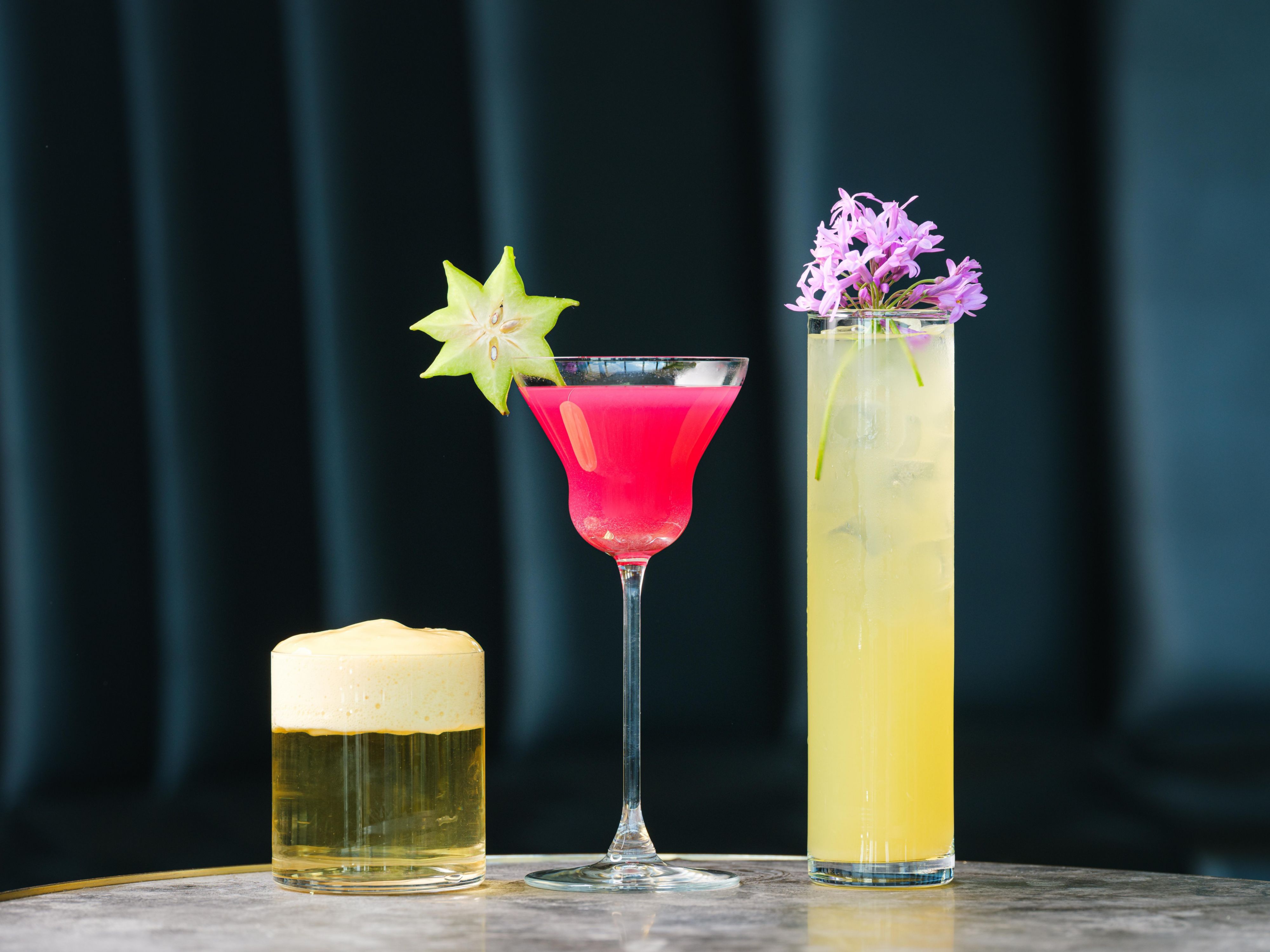 Three vibrant and colourful cocktails
