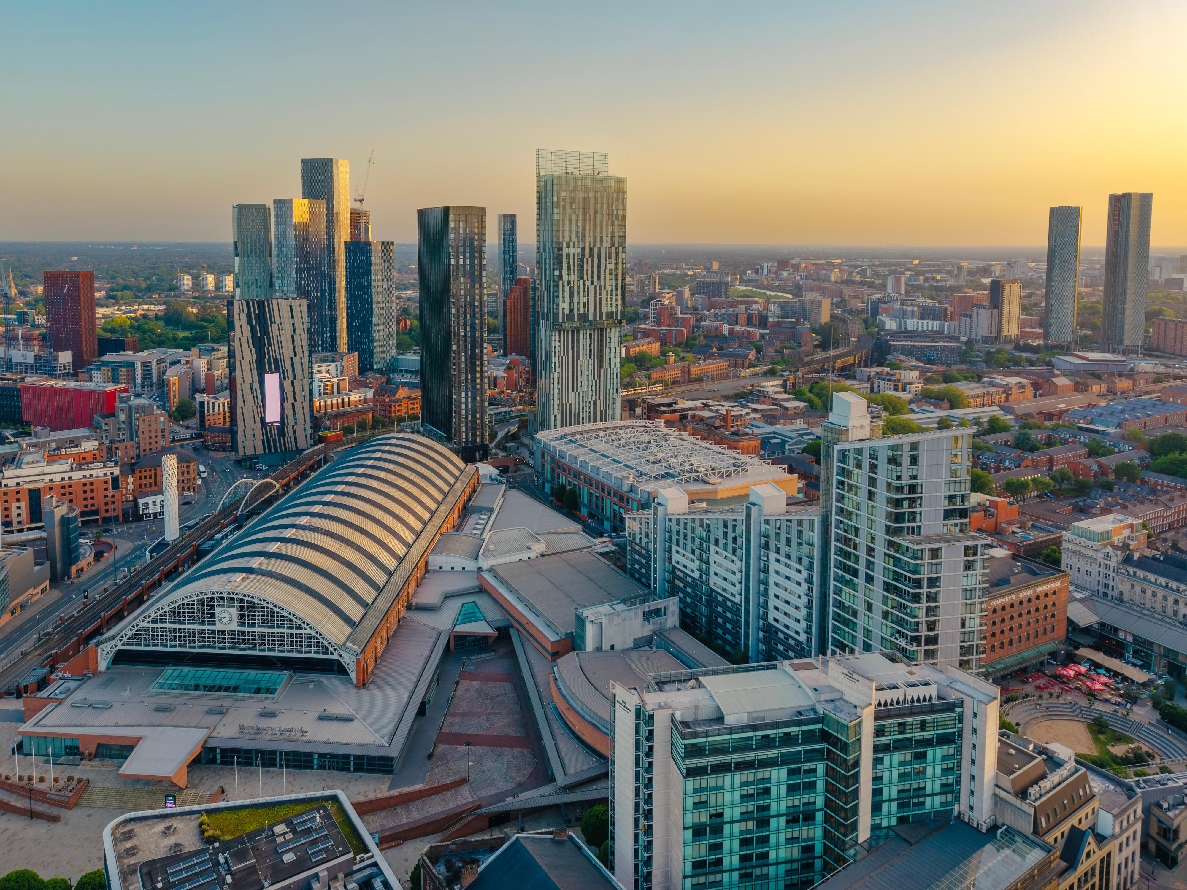 Skyline views from The Manchester Deansgate hotel at sunset glow