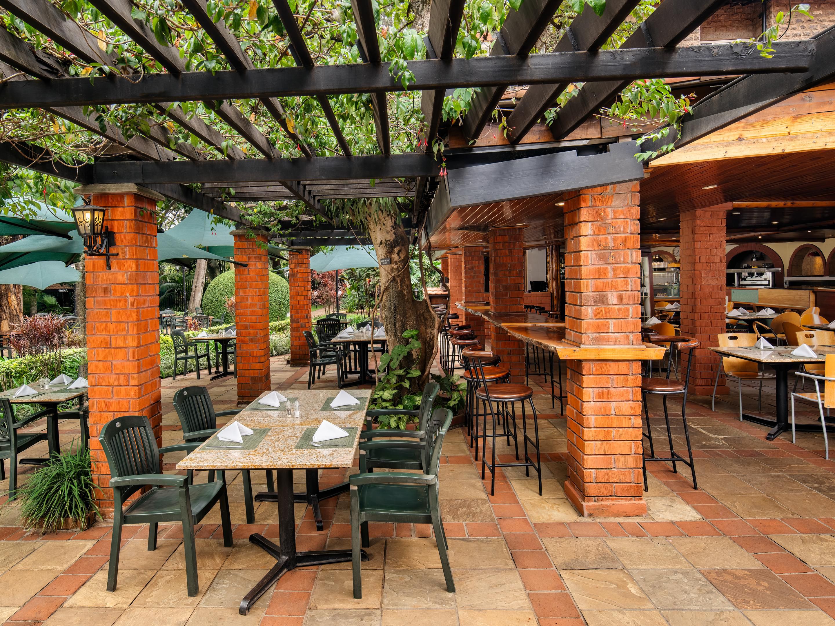 Discover the Mukutan Garden Café, a charming eatery nestled in verdant gardens. Serving some of the most exquisite pastries and coffee in Nairobi, we offer quick meals around the clock that delight in a setting that enchants.