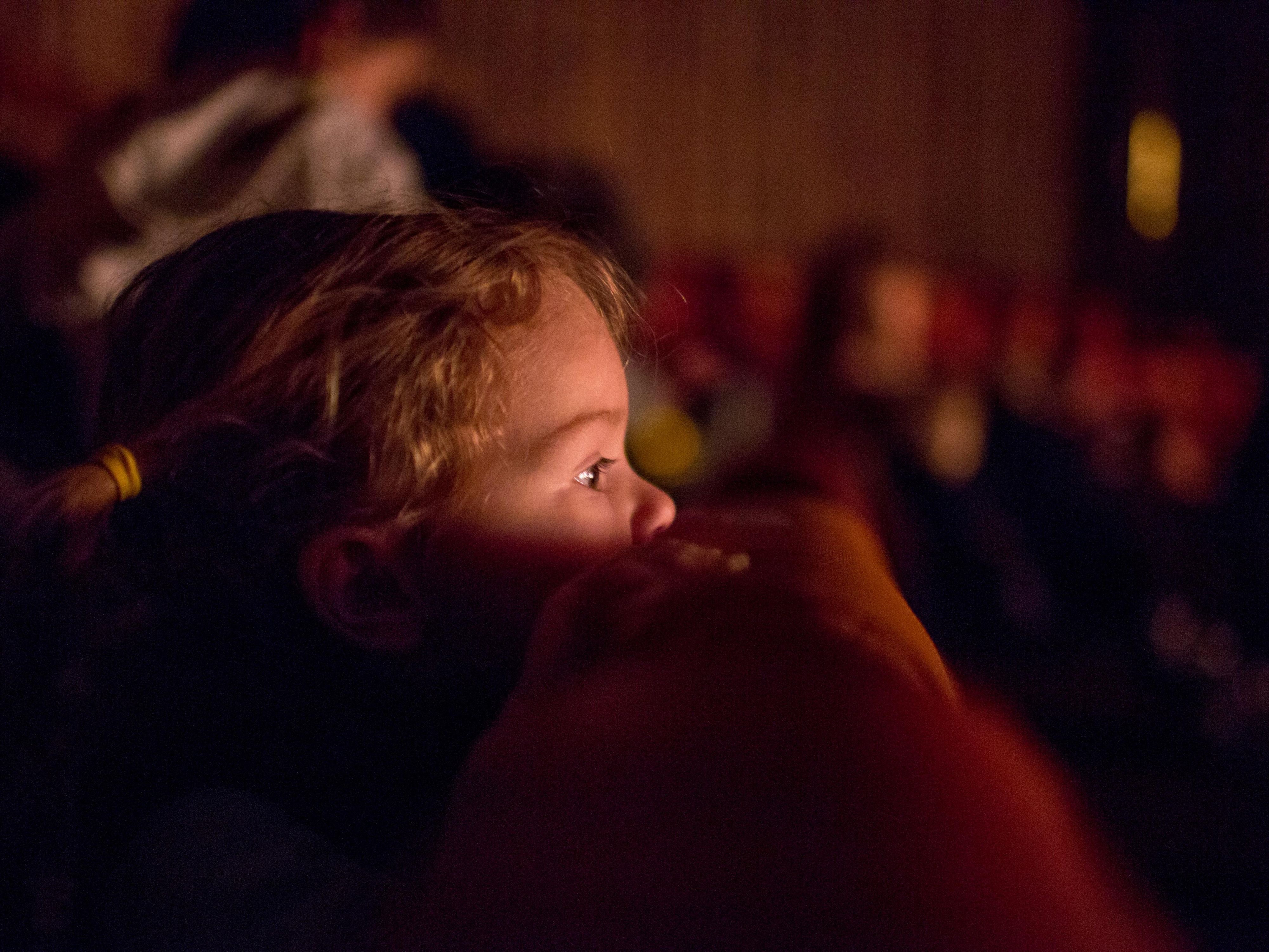 kid watching a play