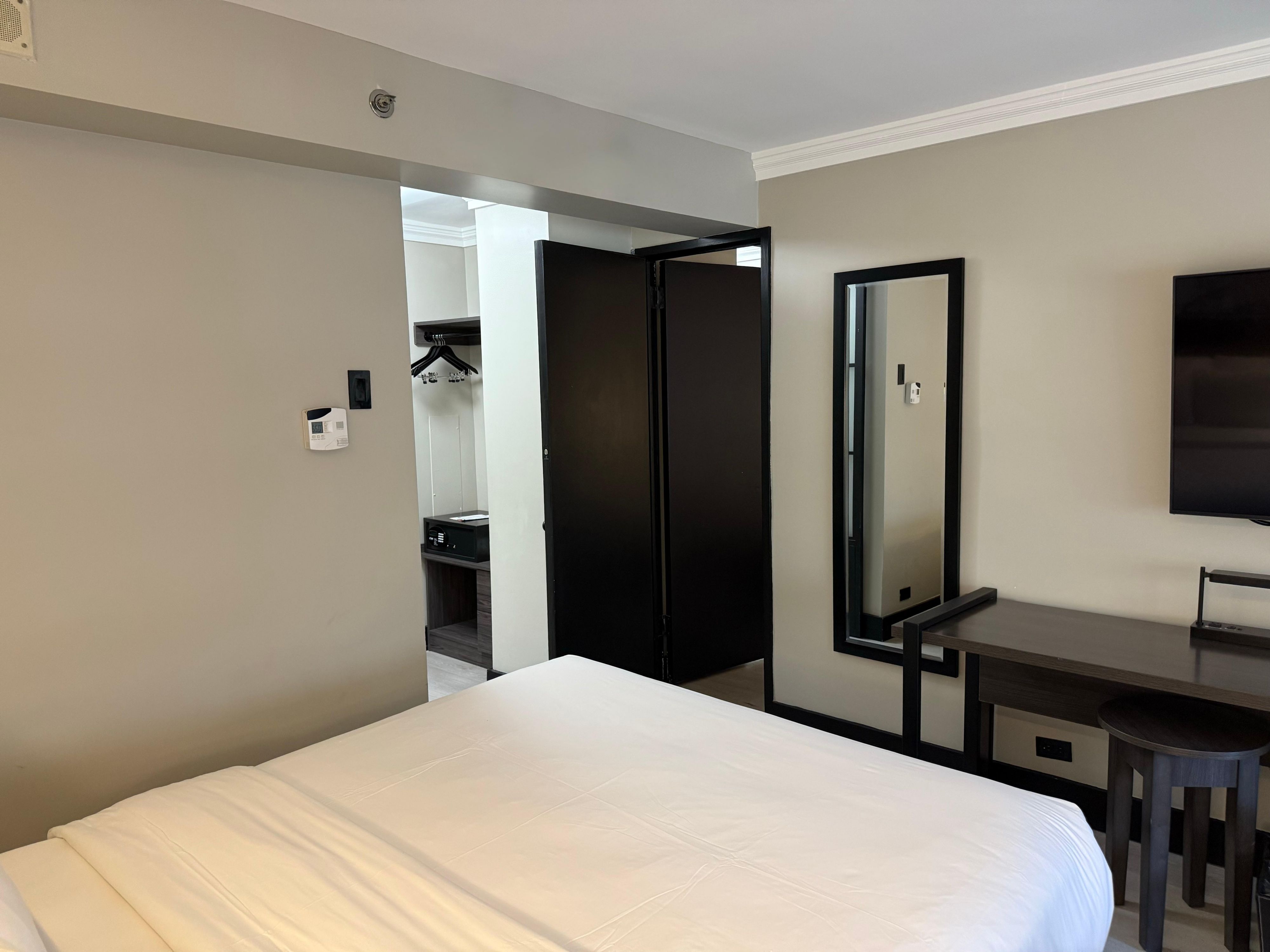 Adjoining room with a view of the bed