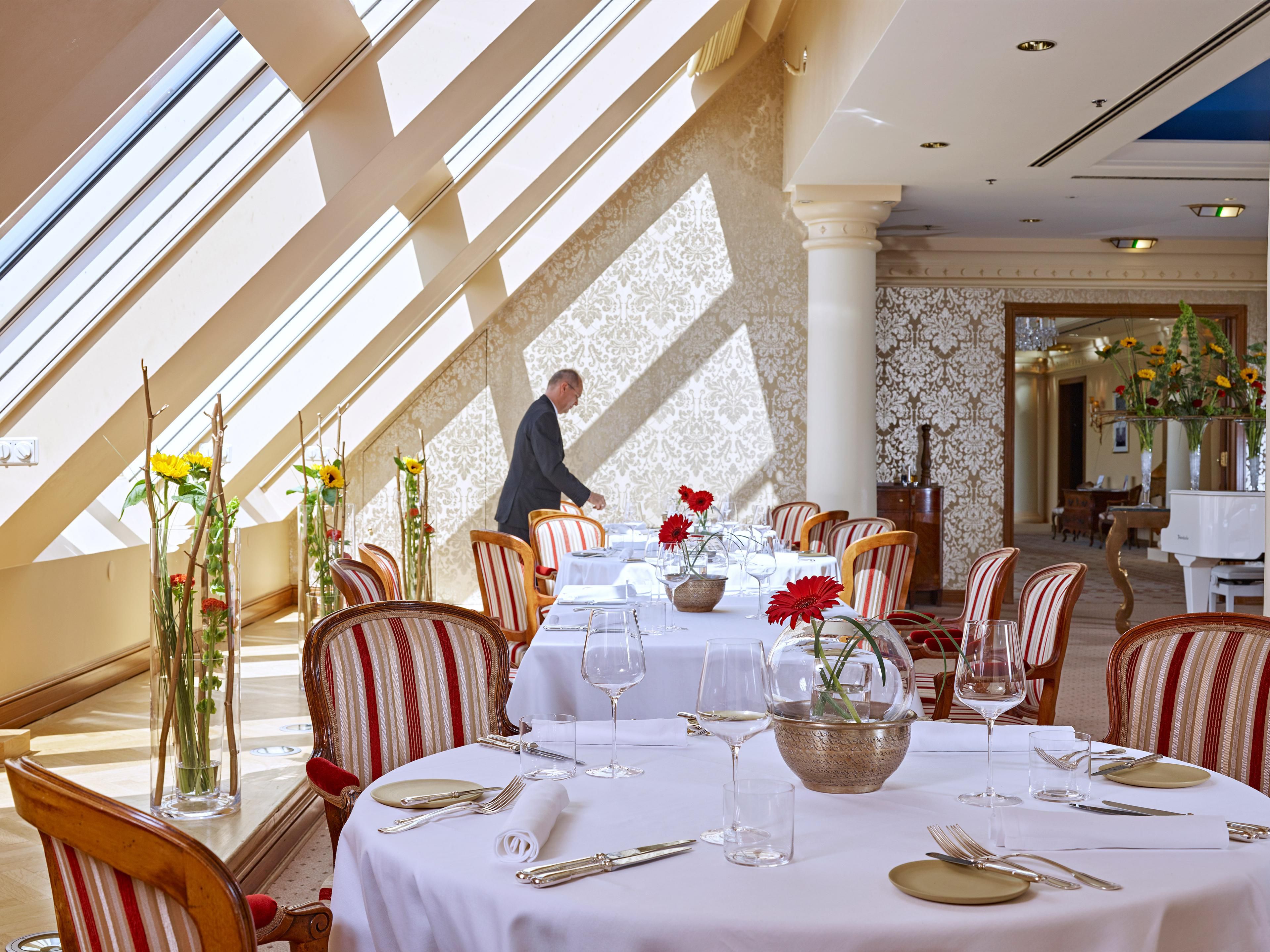 Live piano in our elegant 7th floor restaurant, Grand Hotel Wien