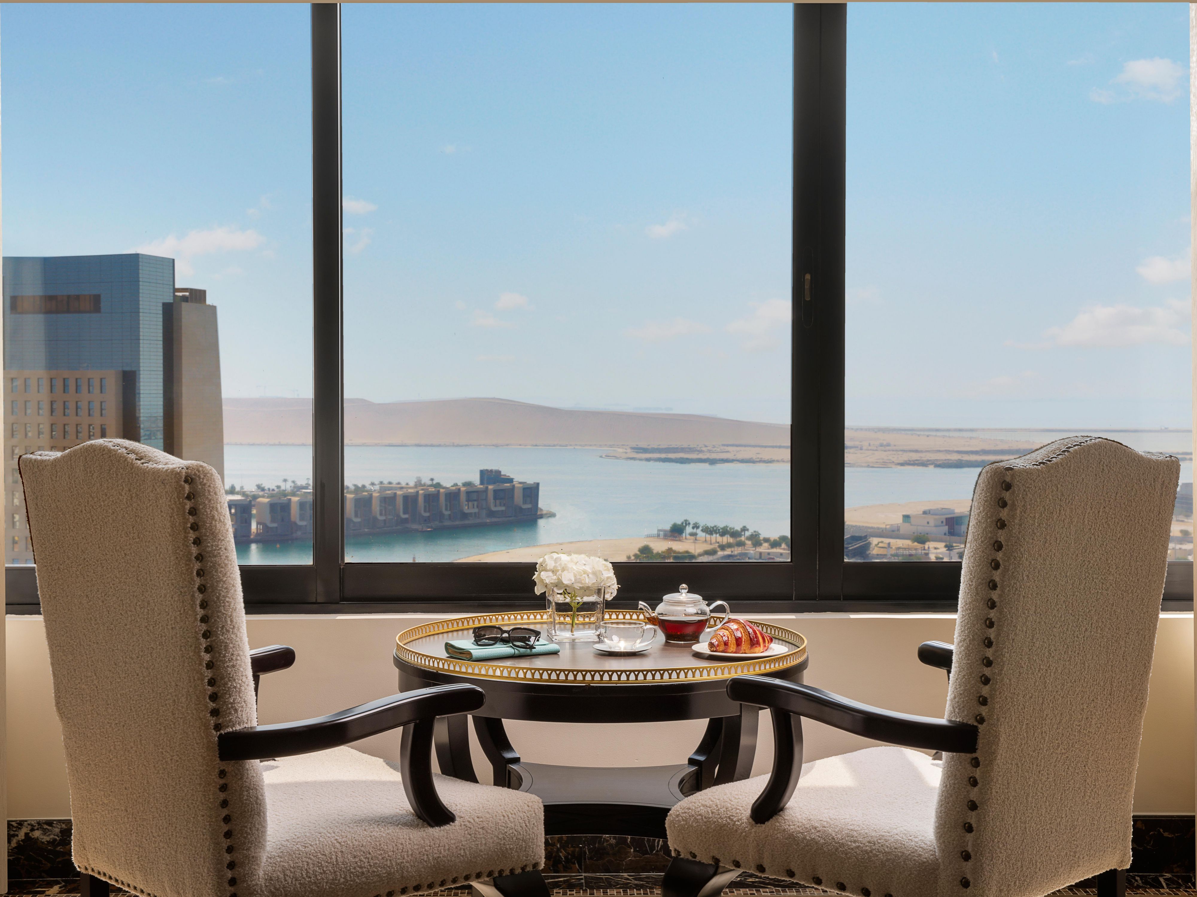 A refined seating moment with panoramic sea views.