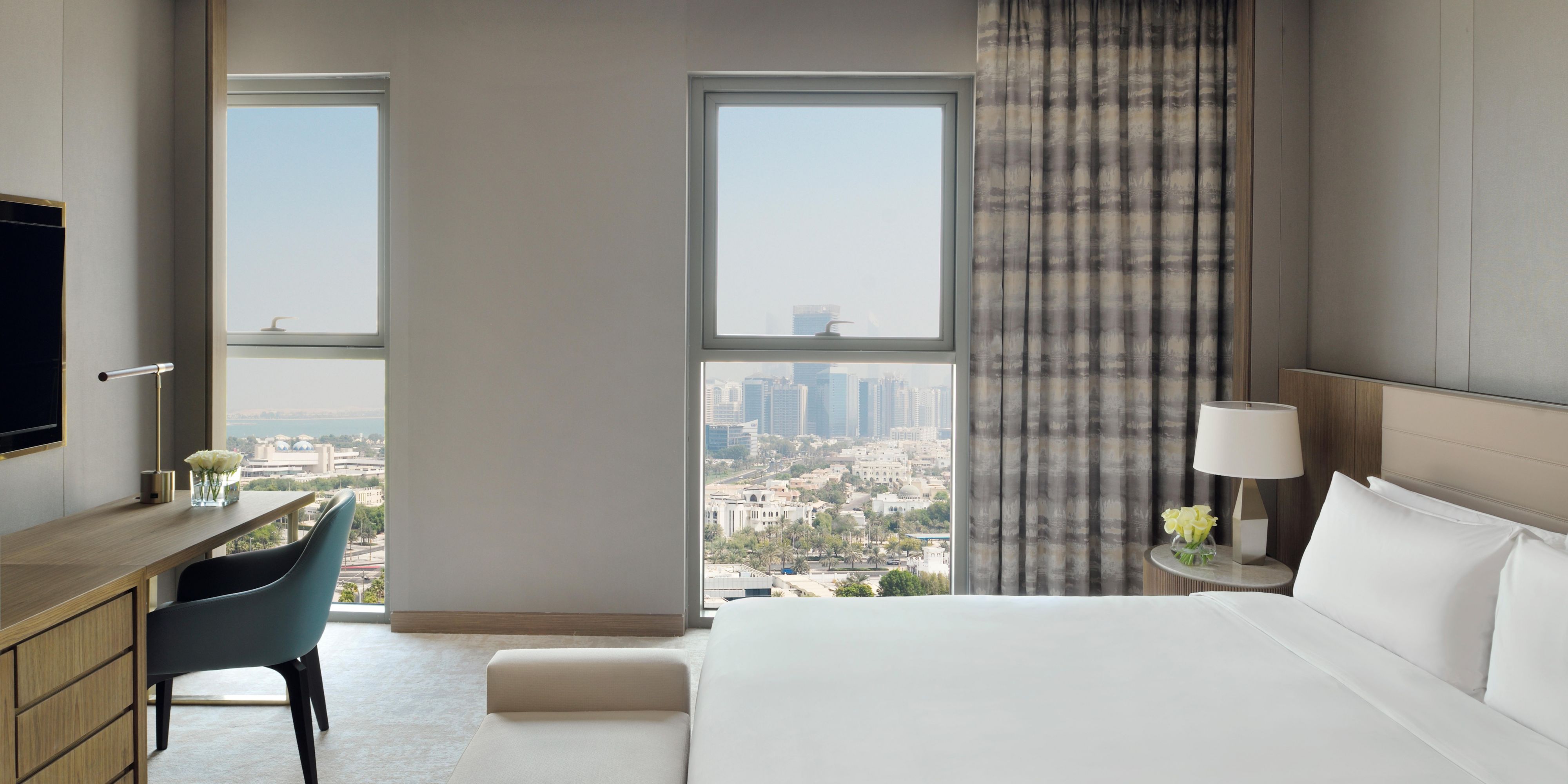 Wake up to breathtaking Abu Dhabi city views from our luxury apart