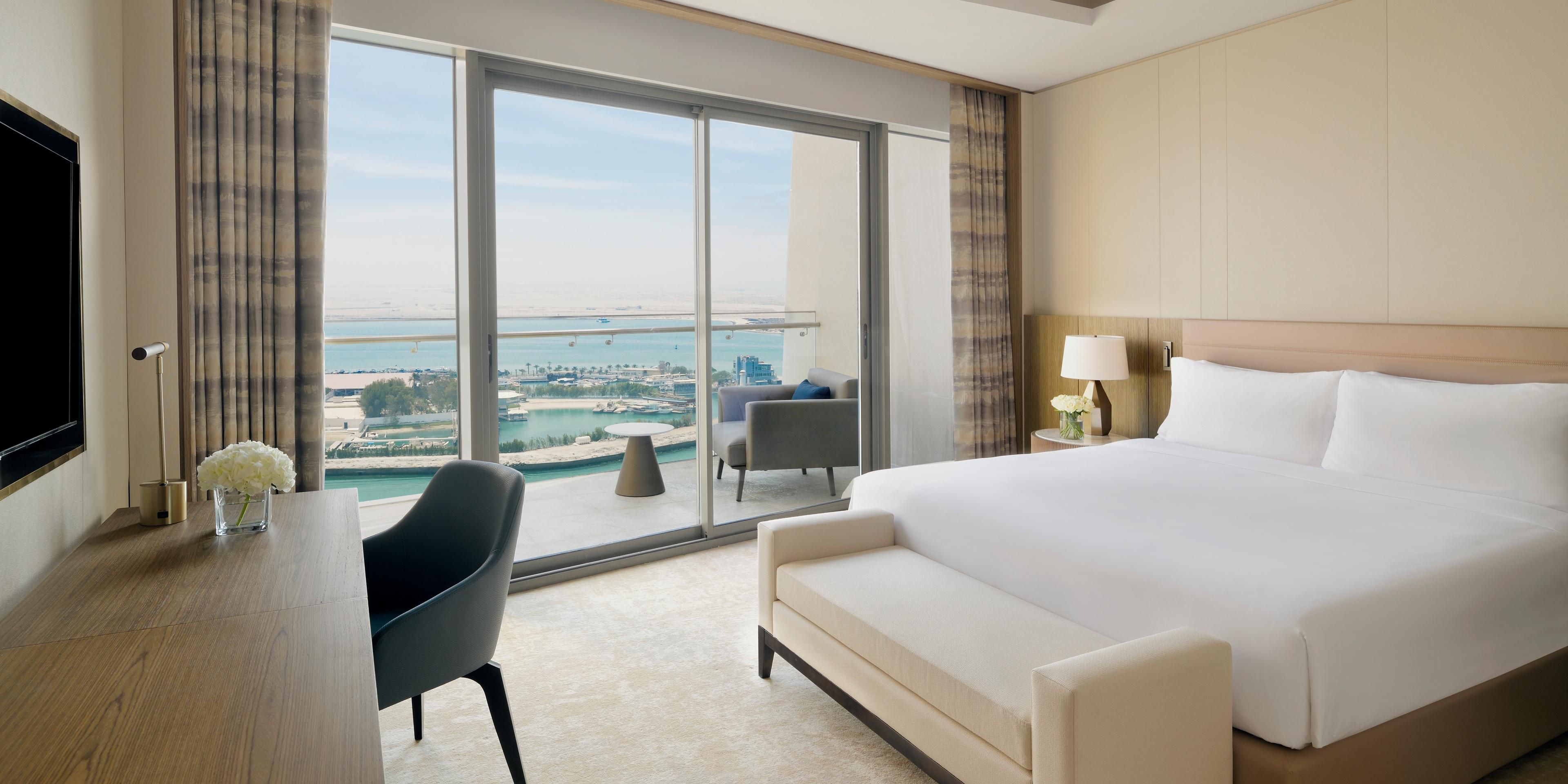 Apartment bedroom with sea views and balconies