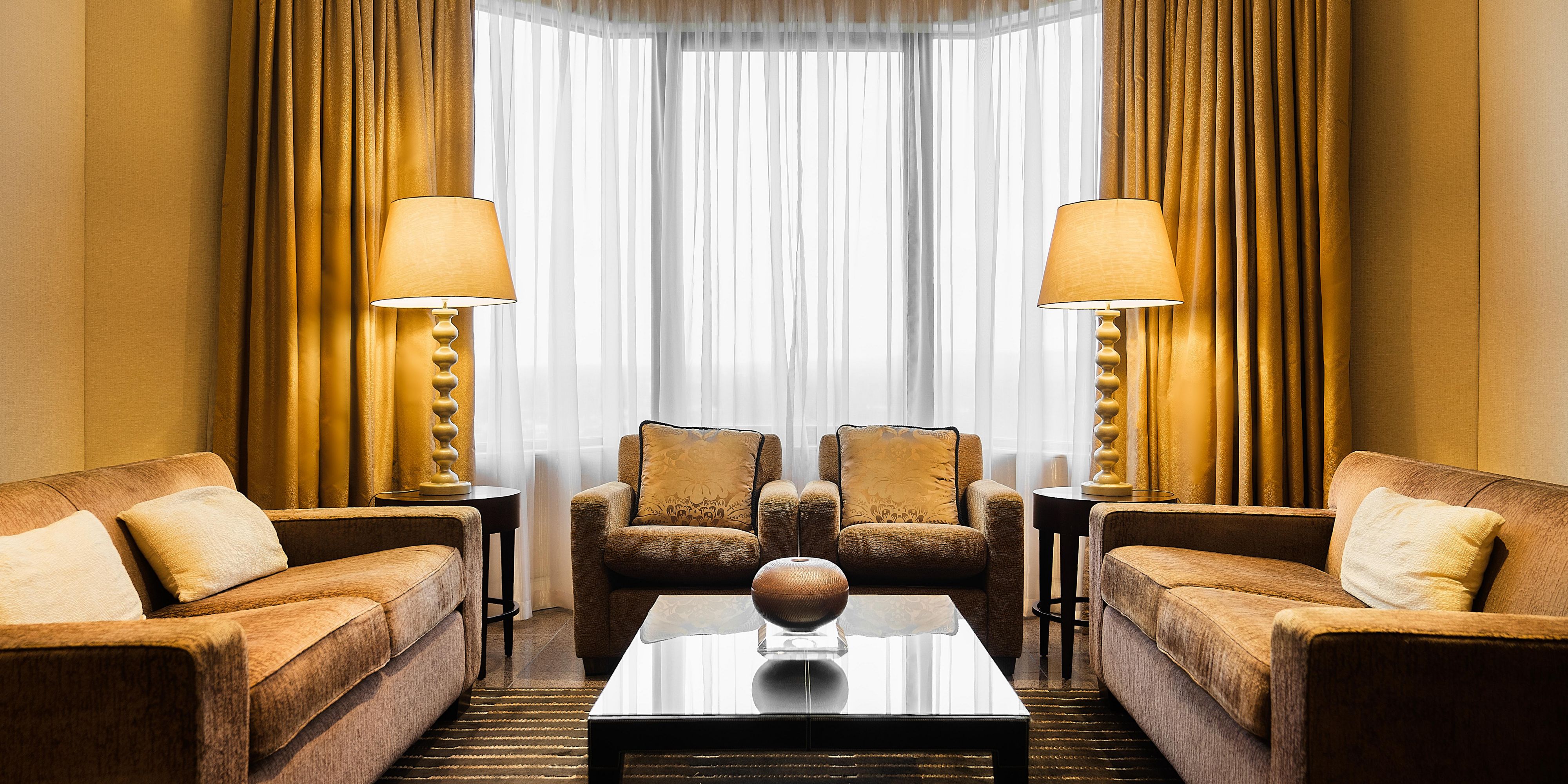 Opulent living room in our Presidential Suite with river views