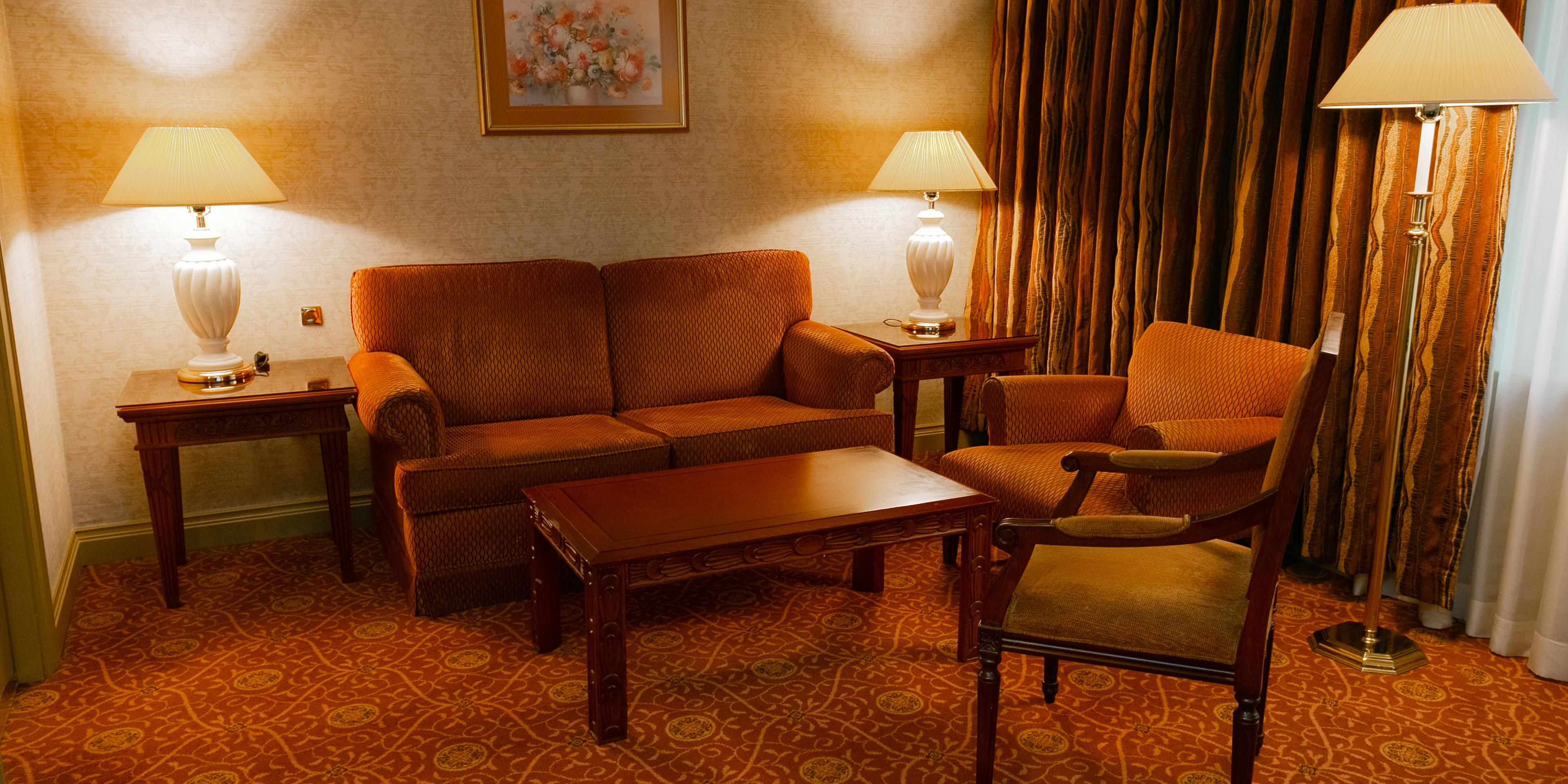 Bask in the warm and cozy ambiance of our comfortable hotel rooms 
