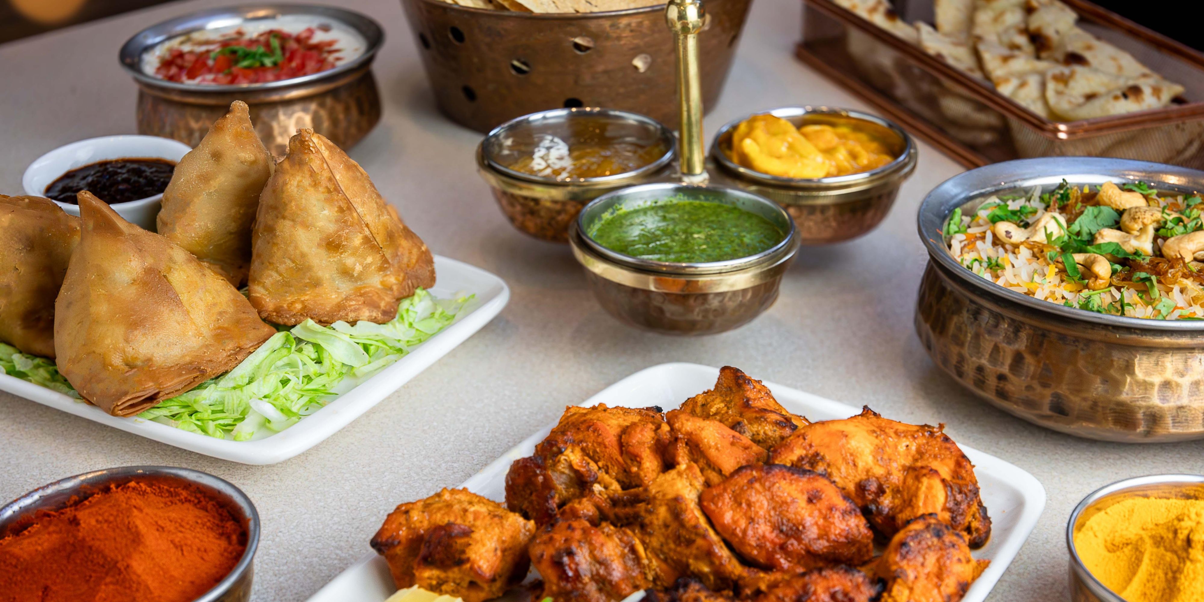 Discover the vibrant flavors of India at Indu, where every dish is a celebration of tradition & taste. From fragrant curries to sizzling tandoori specialties, our diverse menu showcases the rich culinary heritage of India, crafted with the finest ingredients & authentic spices. Indu offers a dining experience that delights every palate. 