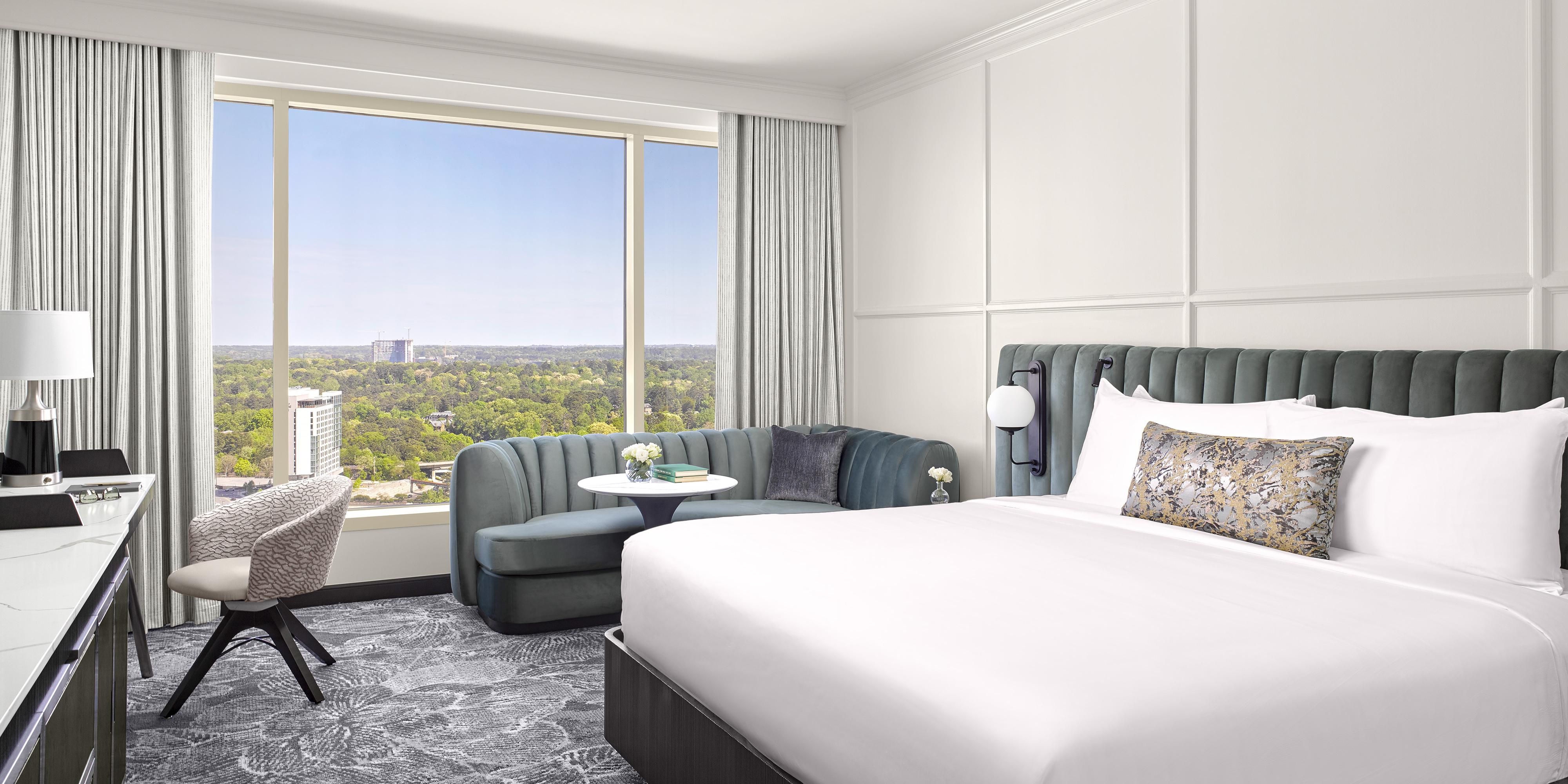 Relax in beautifully redesigned rooms and suites with new furnishings and fine fixtures that create a luxurious refuge in the Buckhead. Contemporary décor, and modern technology elevate your experience. Our newly renovated rooms and suites feature large bathrooms with showers and garden tubs and views of Peachtree Road and Stone Mountain.​ 