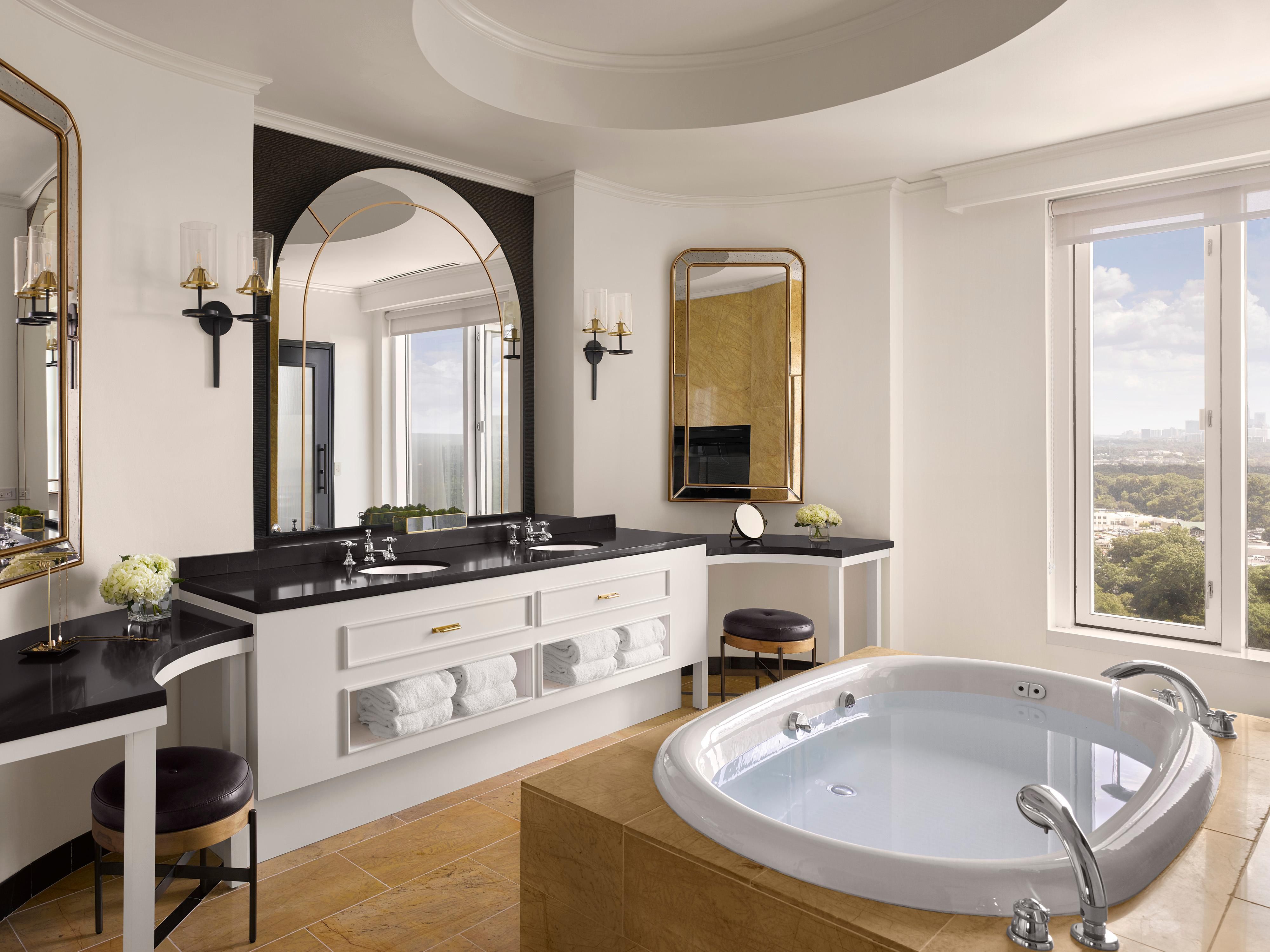 Presidential Bath. Double sinks, soaking tub and dressing tables.