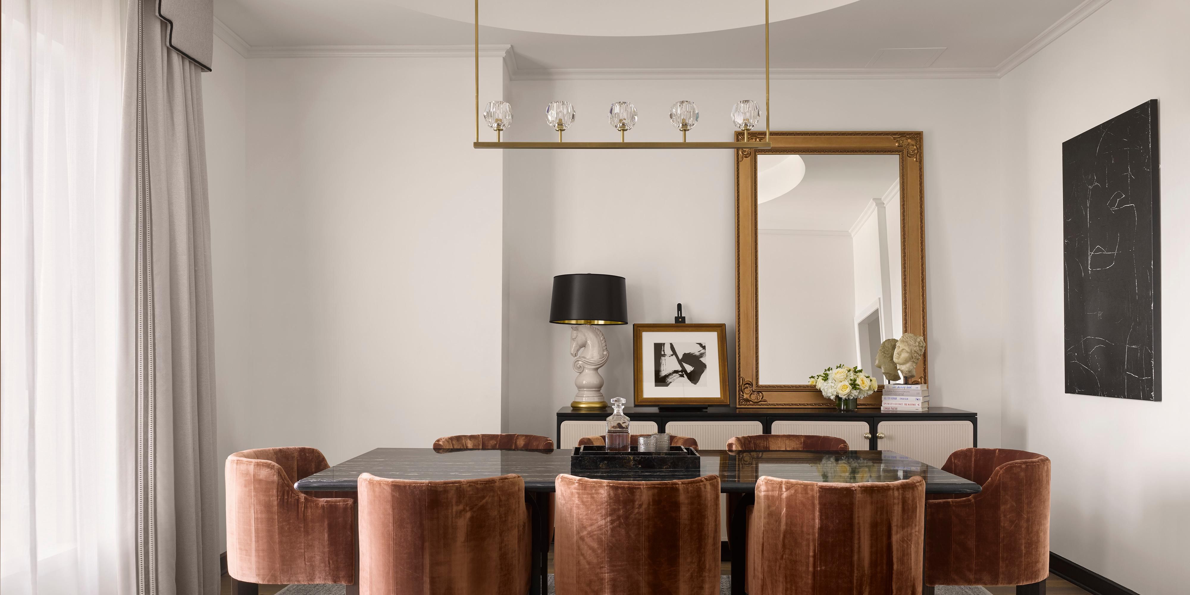 Presidential Suite Dining Room with Velvet Chairs and Sideboard.