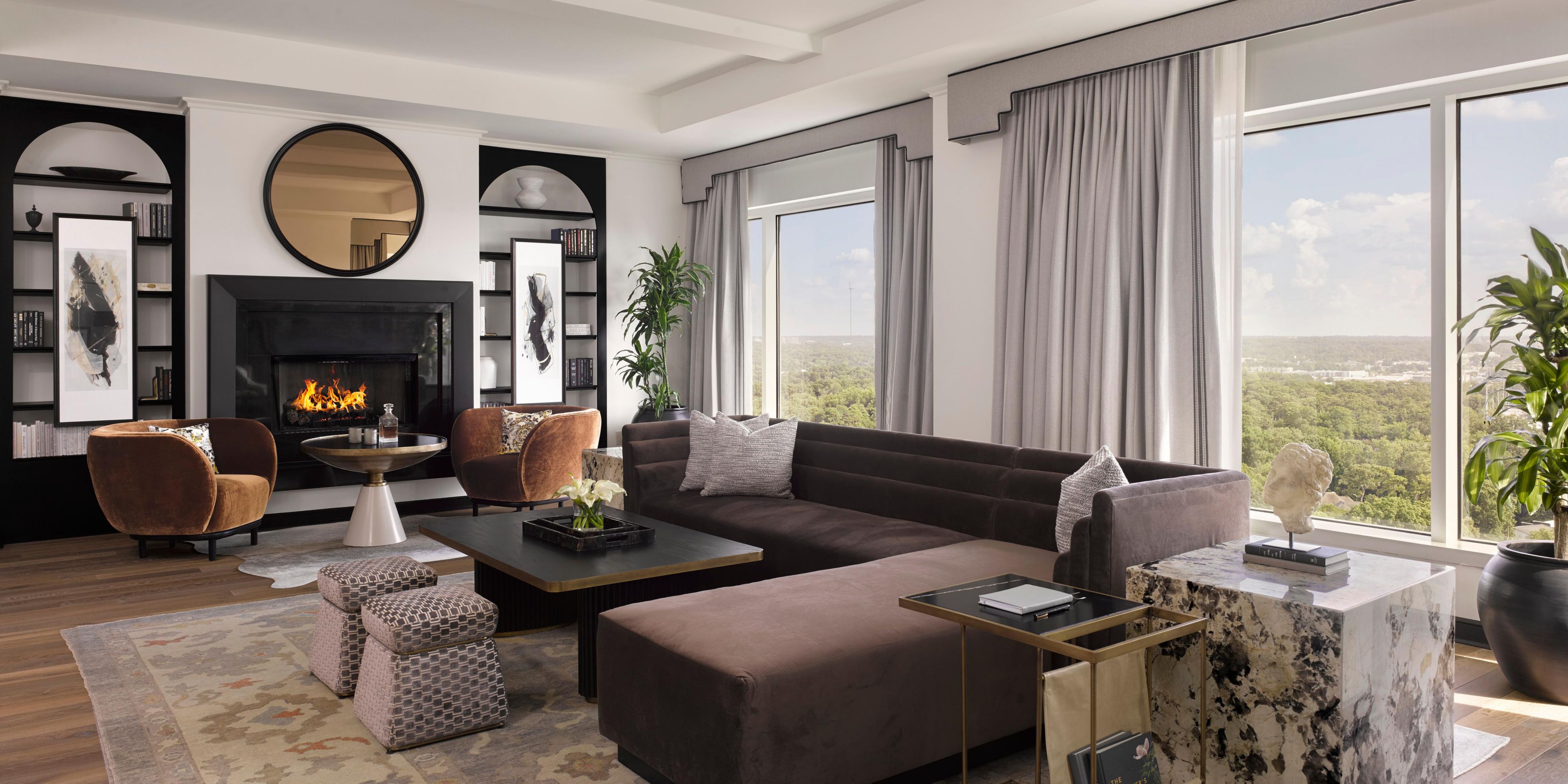 Unwind in luxury with a fireplace and city views.