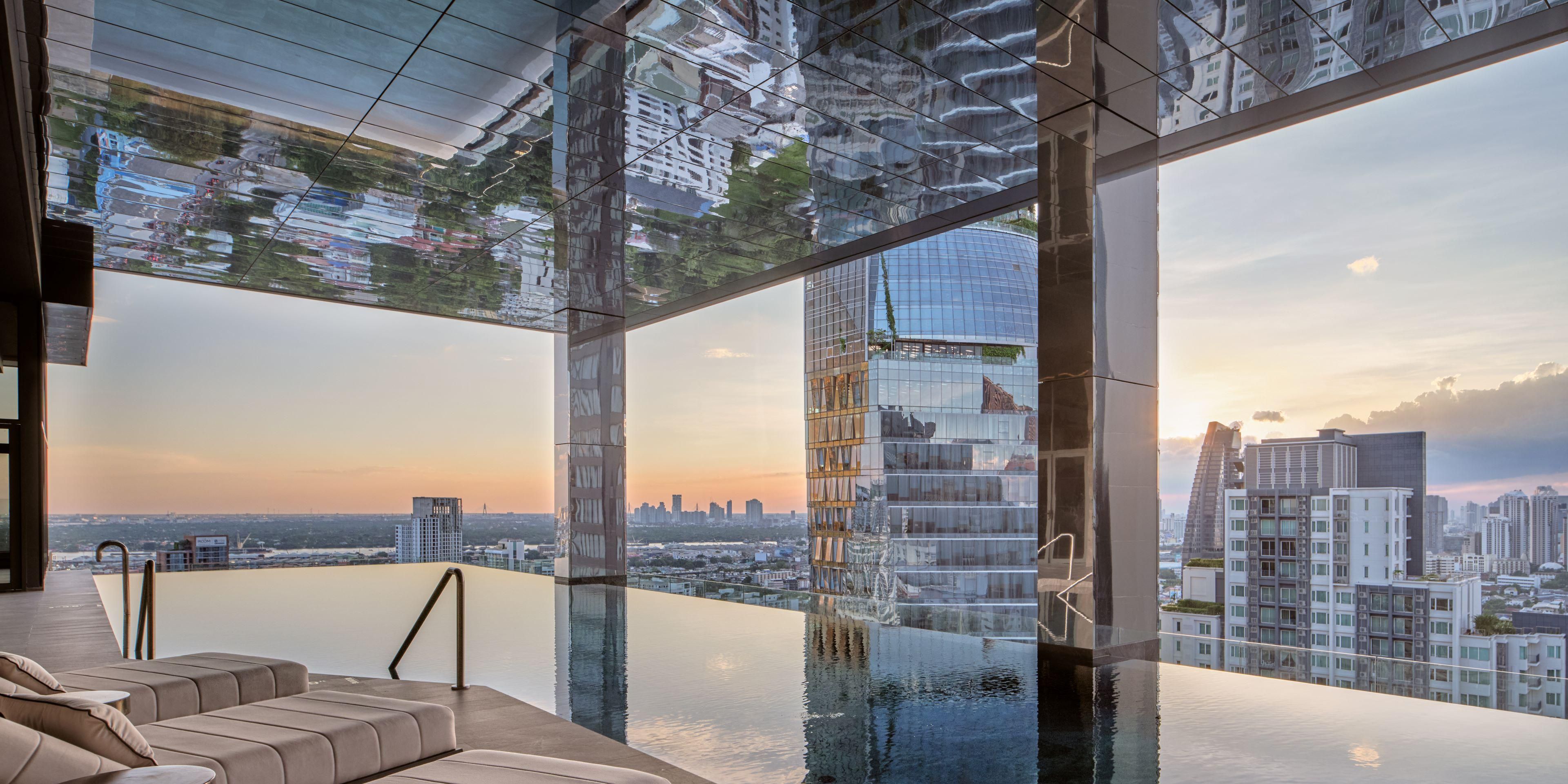 Embrace holistic wellness at our spa, where Japanese and Thai traditions converge for tranquility and rejuvenation. Our skilled therapists harness nature's botanical treasures. Meanwhile, our indoor infinity edge pool offers stunning Sukhumvit skyline views, providing a unique and unforgettable aquatic retreat amidst luxurious surroundings.